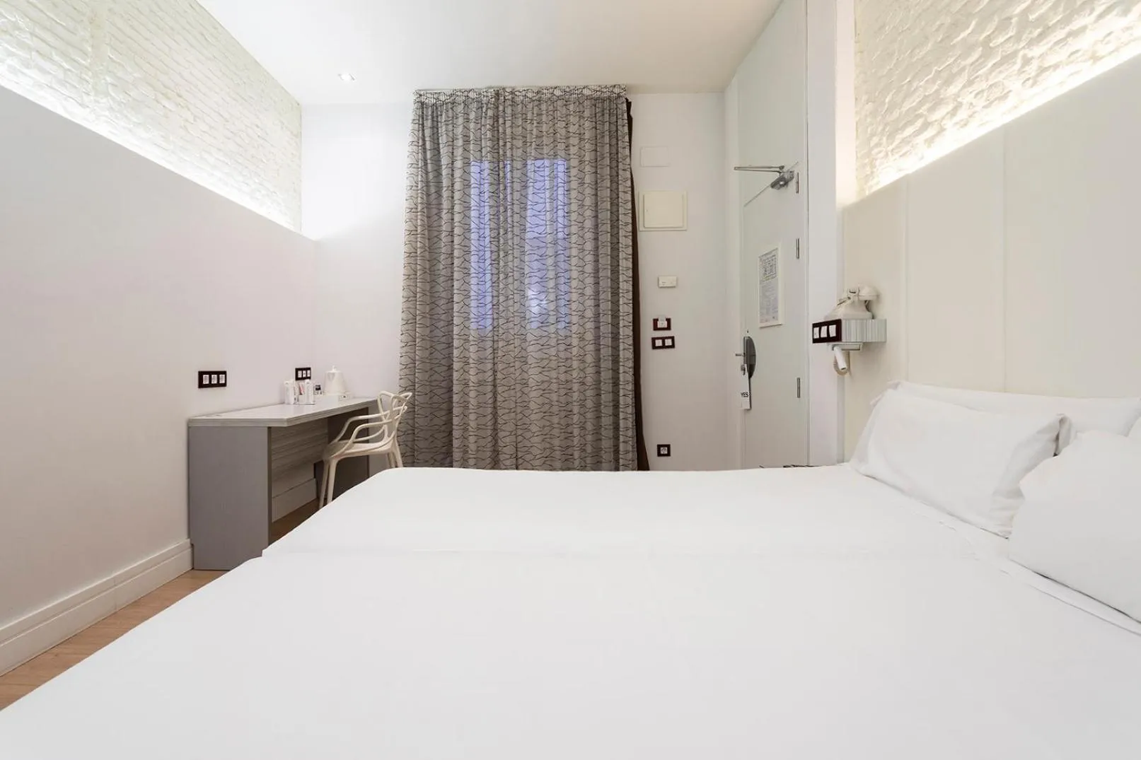 Bed in Petit Palace Lealtad Plaza