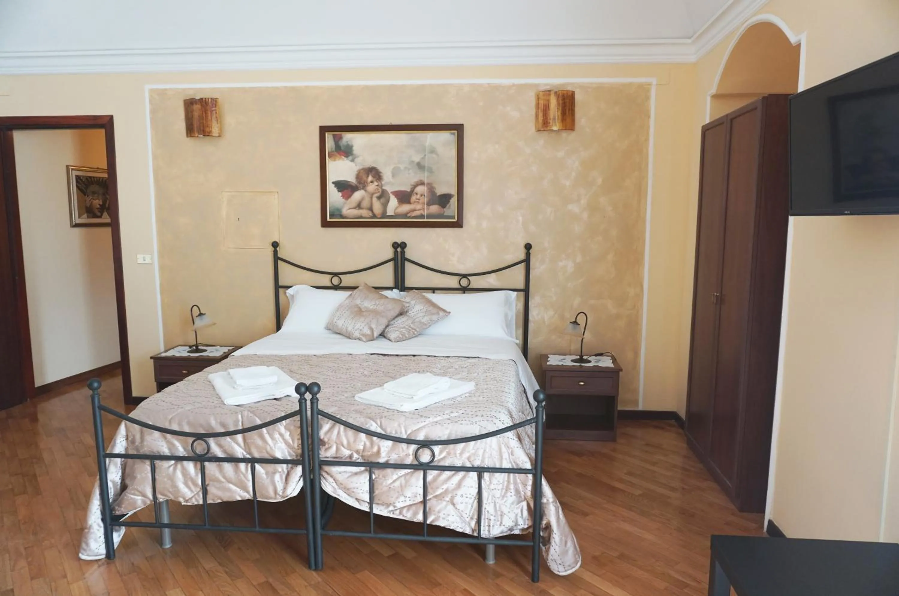 Bed in LA TERRAZZA SUL CORSO City Center