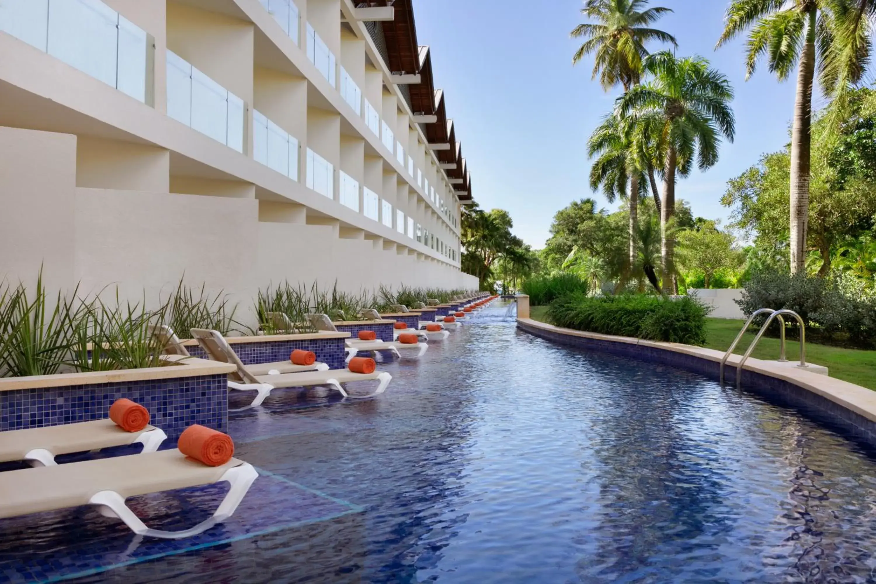 Enclave Swim-Out Garden View - single occupancy - 2 Queens in Hilton La Romana All-Inclusive Family Resort Enclave Swim-Out Garden View - single occupancy - 2 Queens in Hilton La Romana All-Inclusive Family Resort