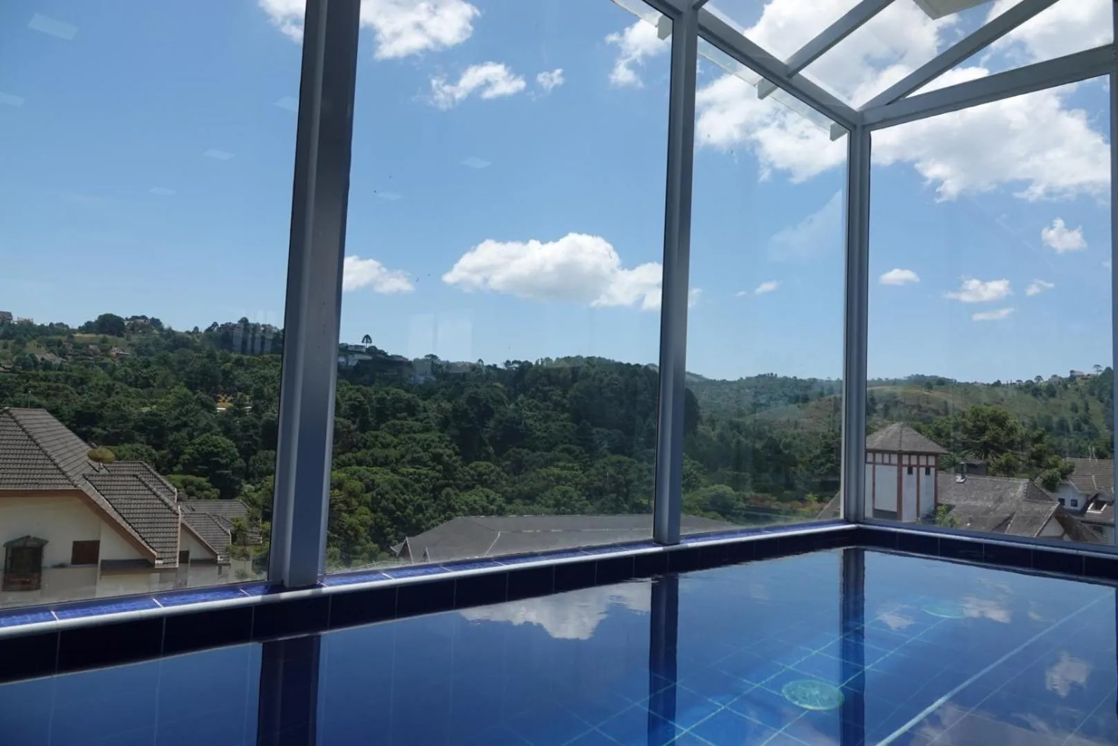 Swimming pool in Kaliman Pousada Campos do Jordão