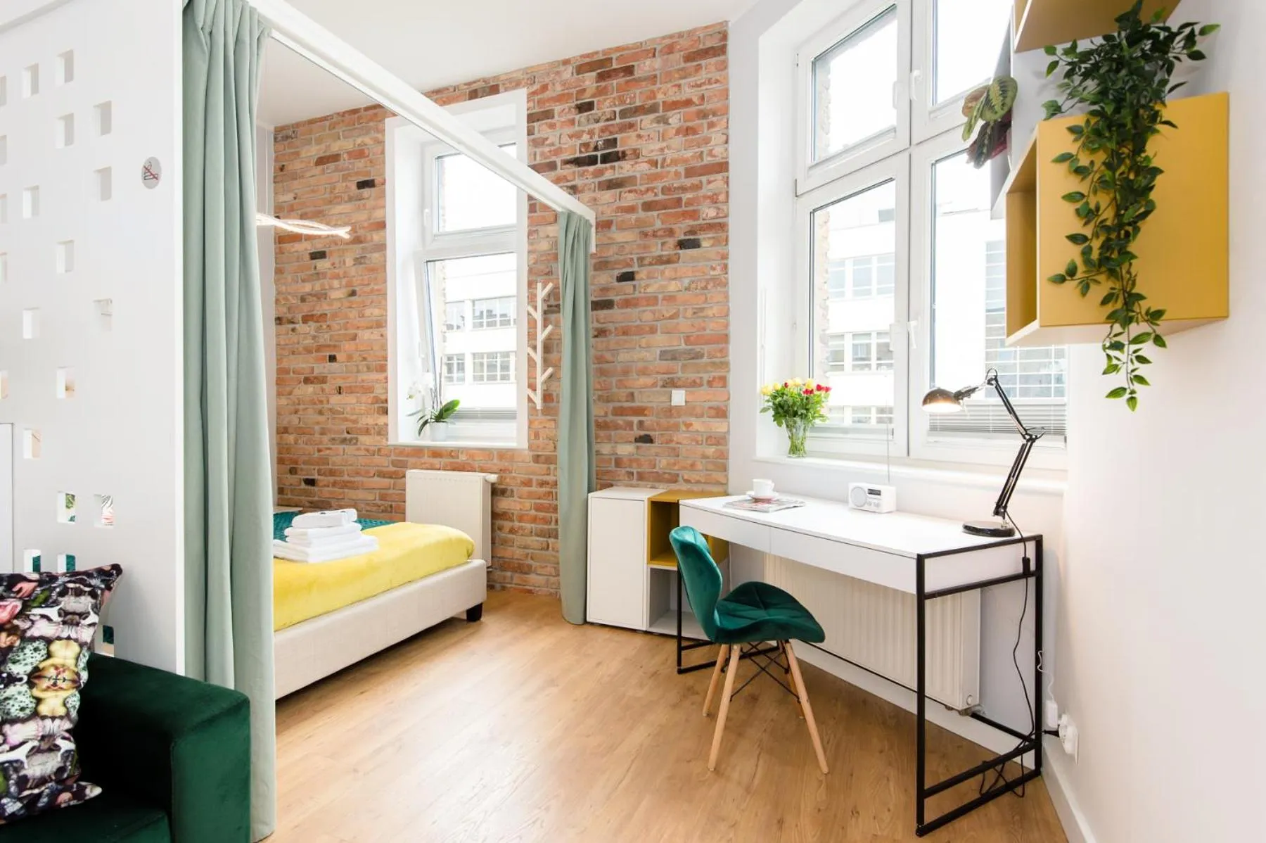 Living room, Bed in Bliss Apartments