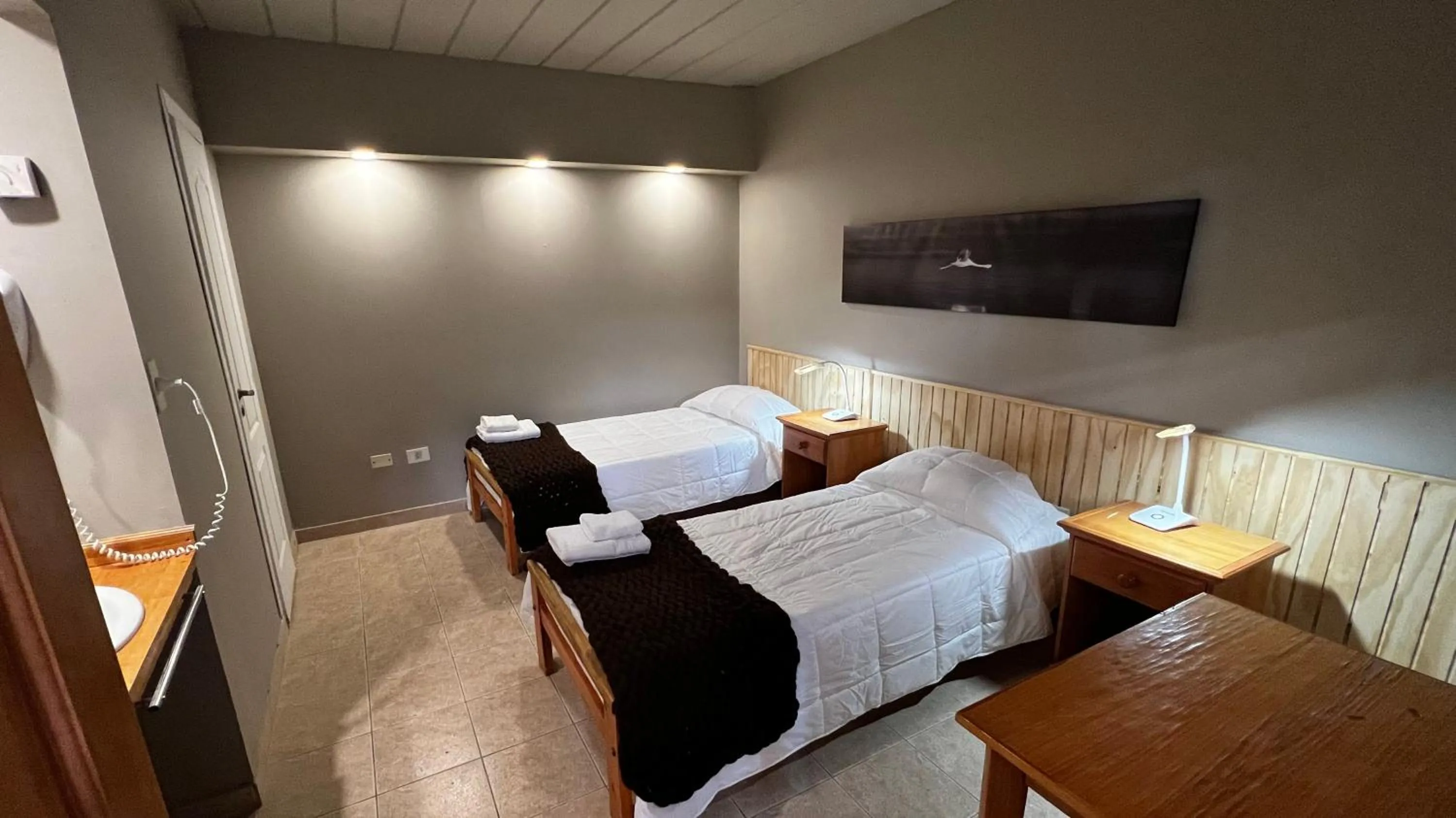 Bed in Del Glaciar Libertador Hotel