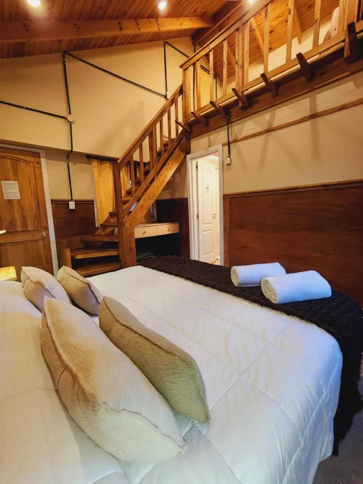 Bed in Del Glaciar Libertador Hotel