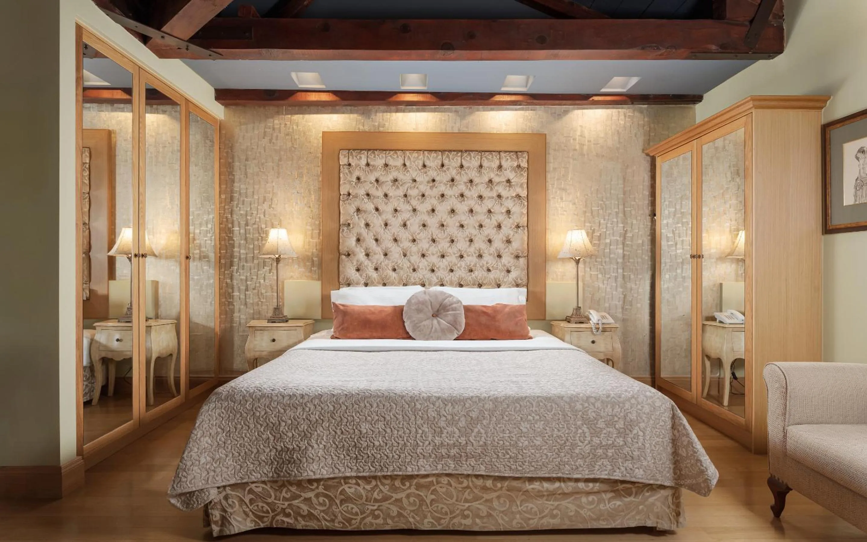 Bed in Civitas Suites Hotel