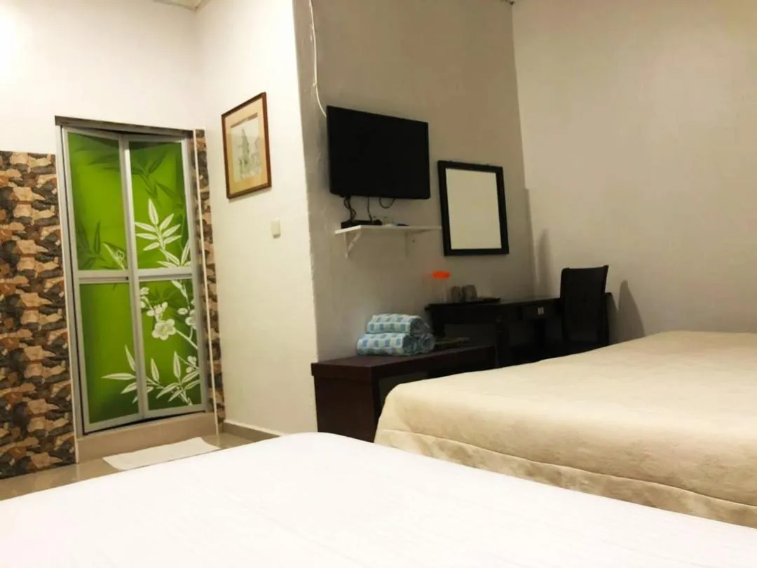 Bed in HOTEL SHAFURA 2