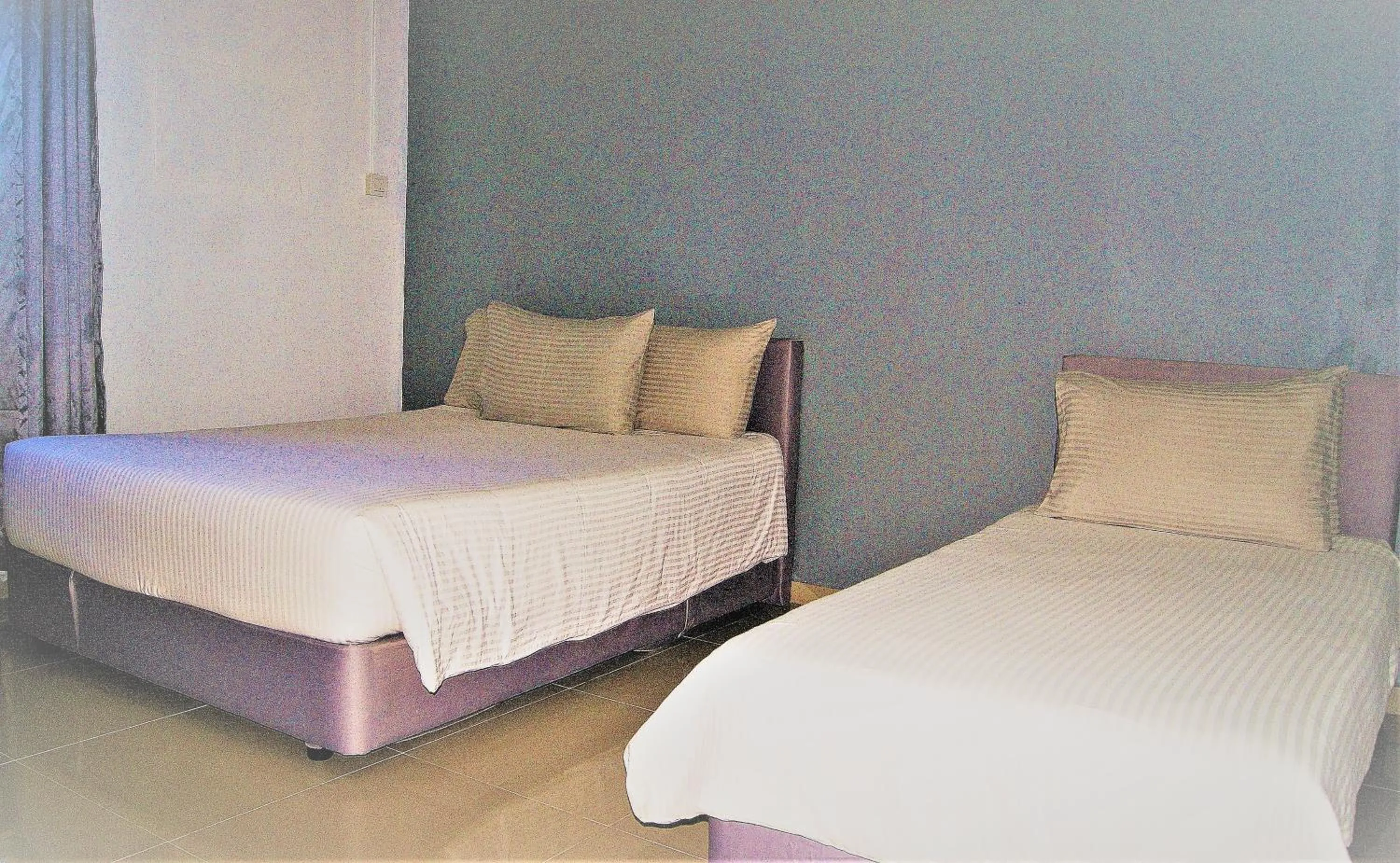 Bed in HOTEL SHAFURA 2