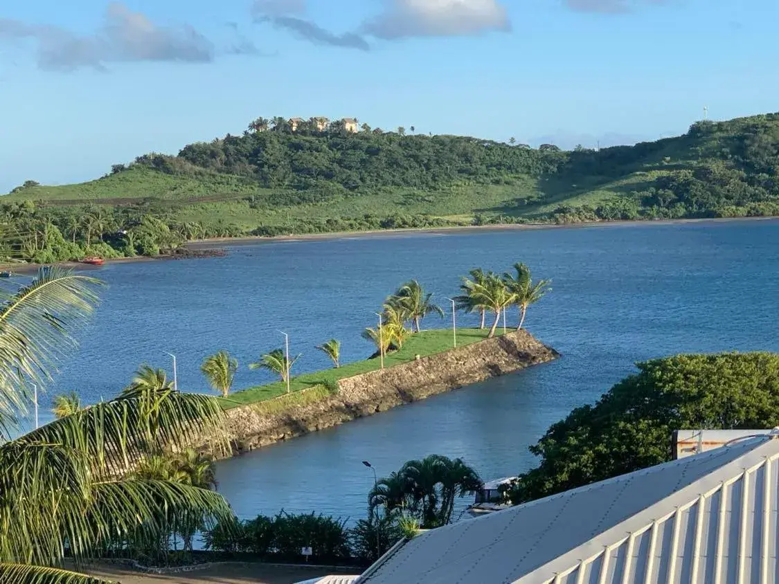 Deluxe Triple Room with Sea View in Dua Dua Beach Resort Deluxe Triple Room with Sea View in Dua Dua Beach Resort