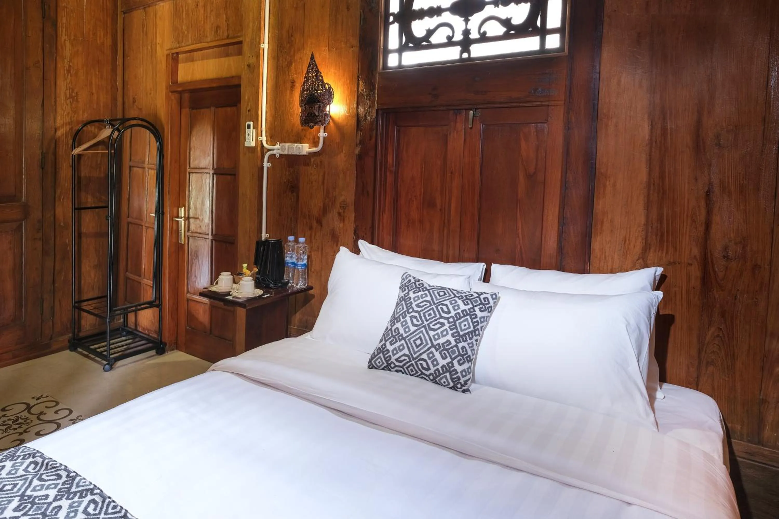 Bed in Kampoeng Joglo Boutique Hotel