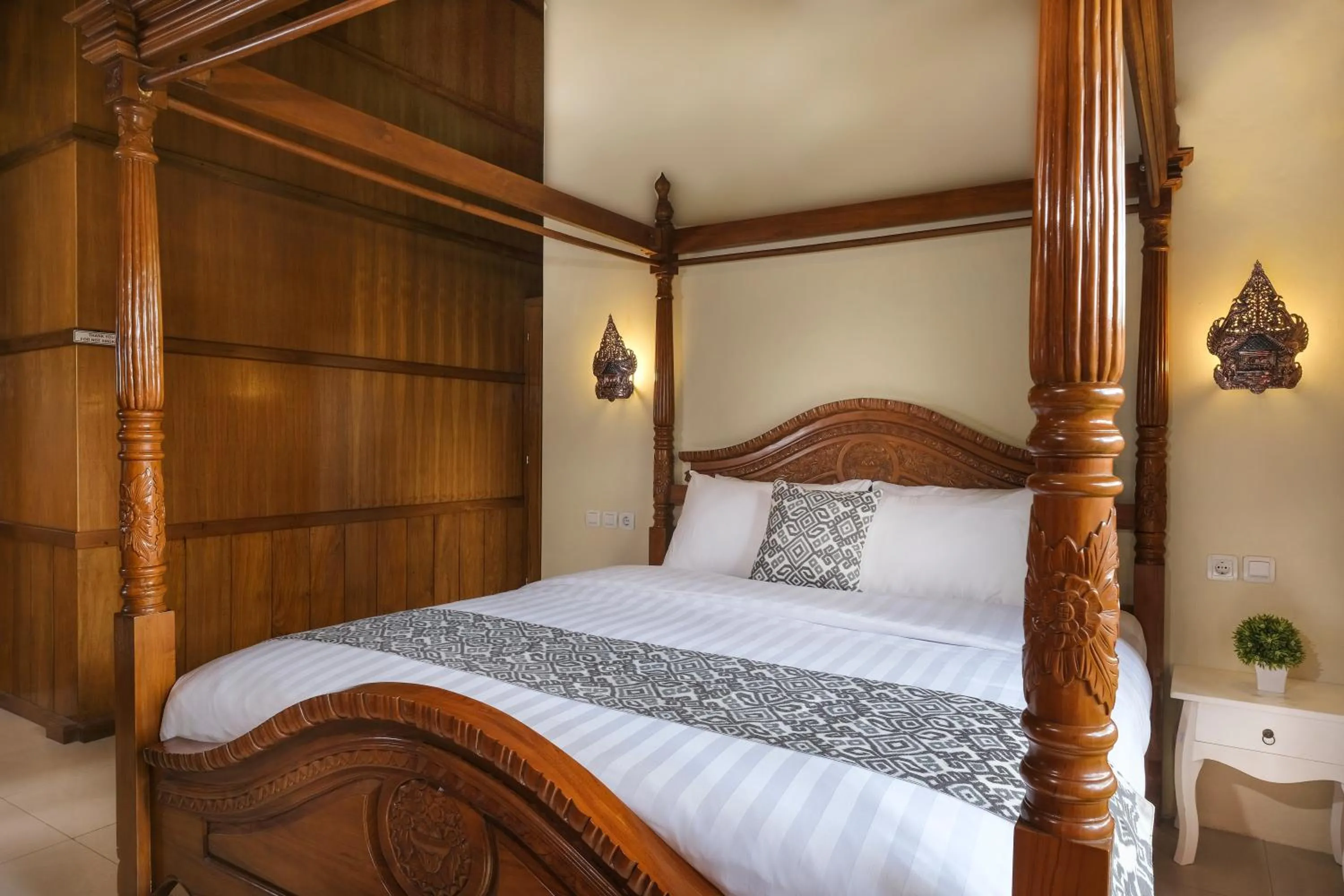 Bed in Kampoeng Joglo Boutique Hotel