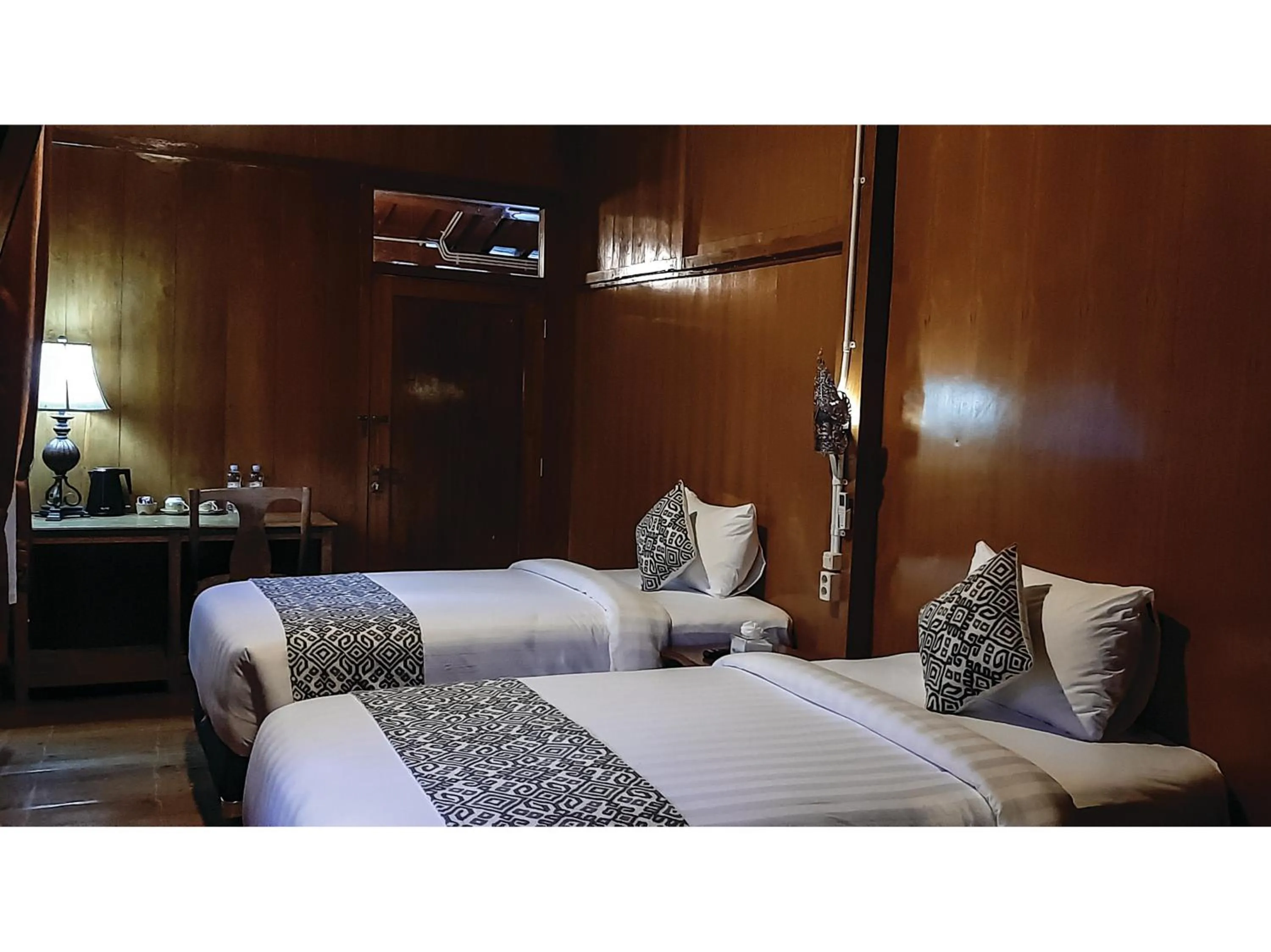 Bed in Kampoeng Joglo Boutique Hotel