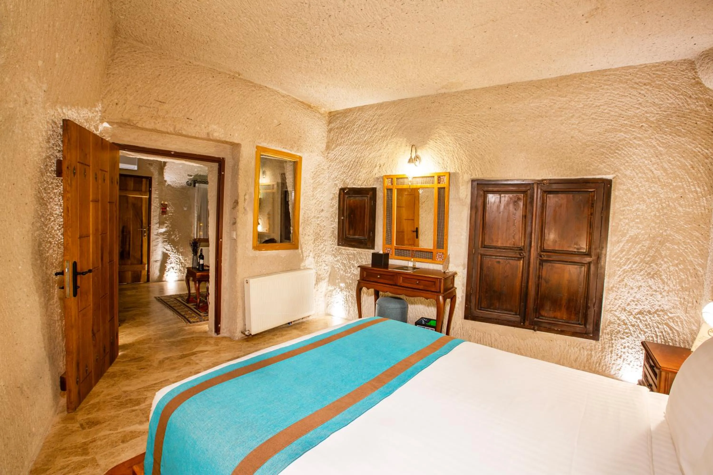 Bed in Imperial Cave Suites & Spa