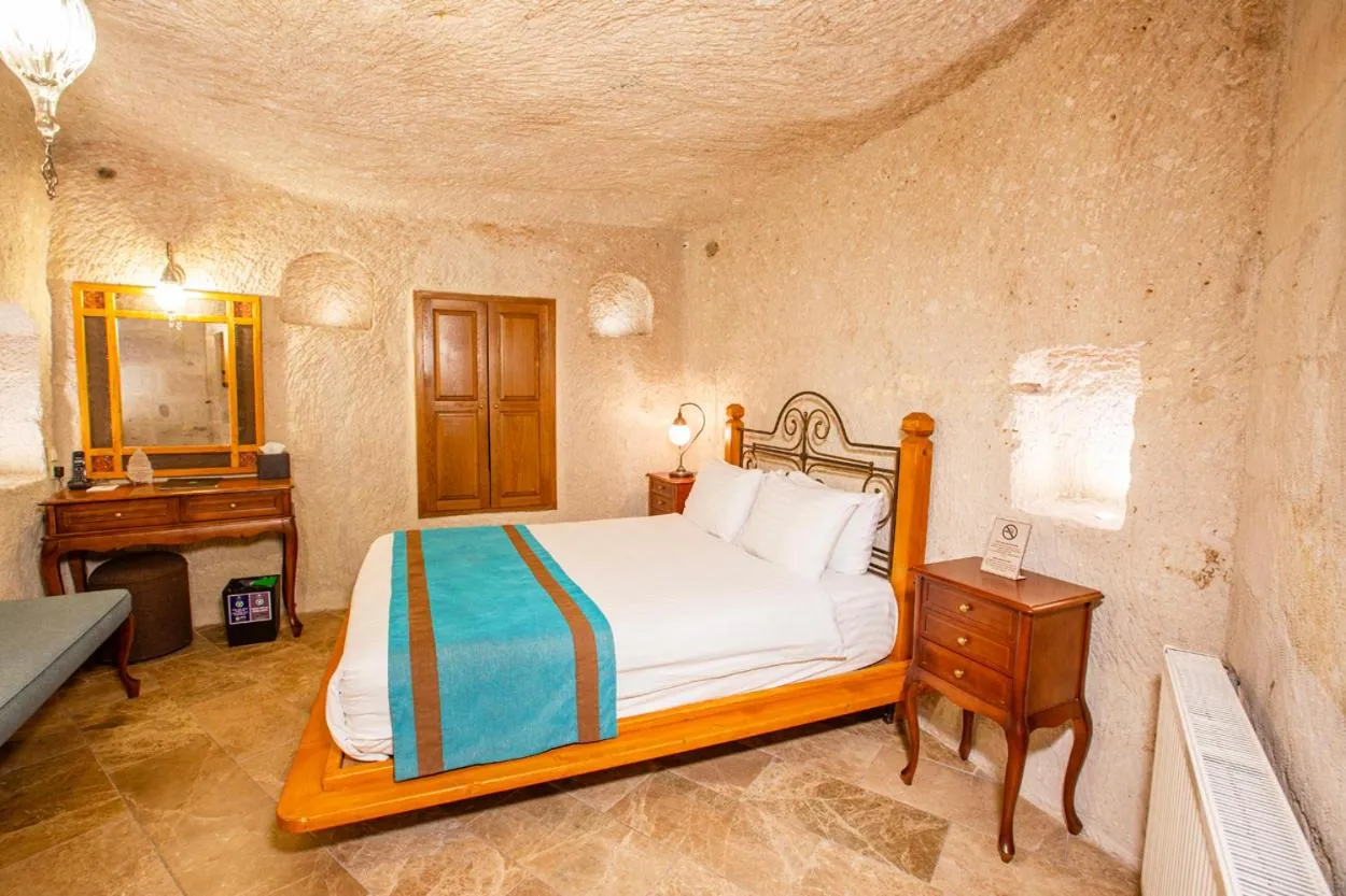 Bed in Imperial Cave Suites & Spa