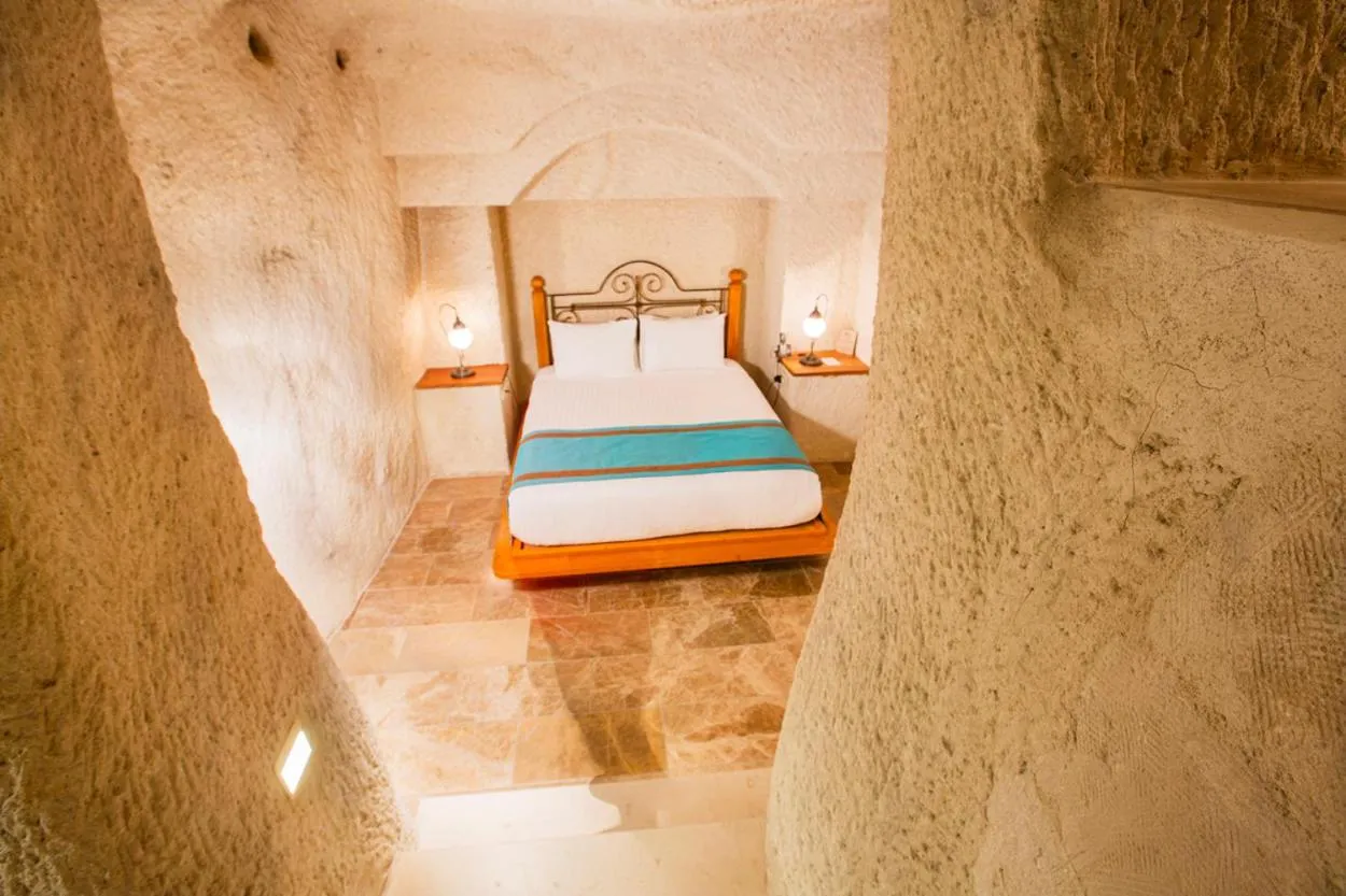 Bed in Imperial Cave Suites & Spa
