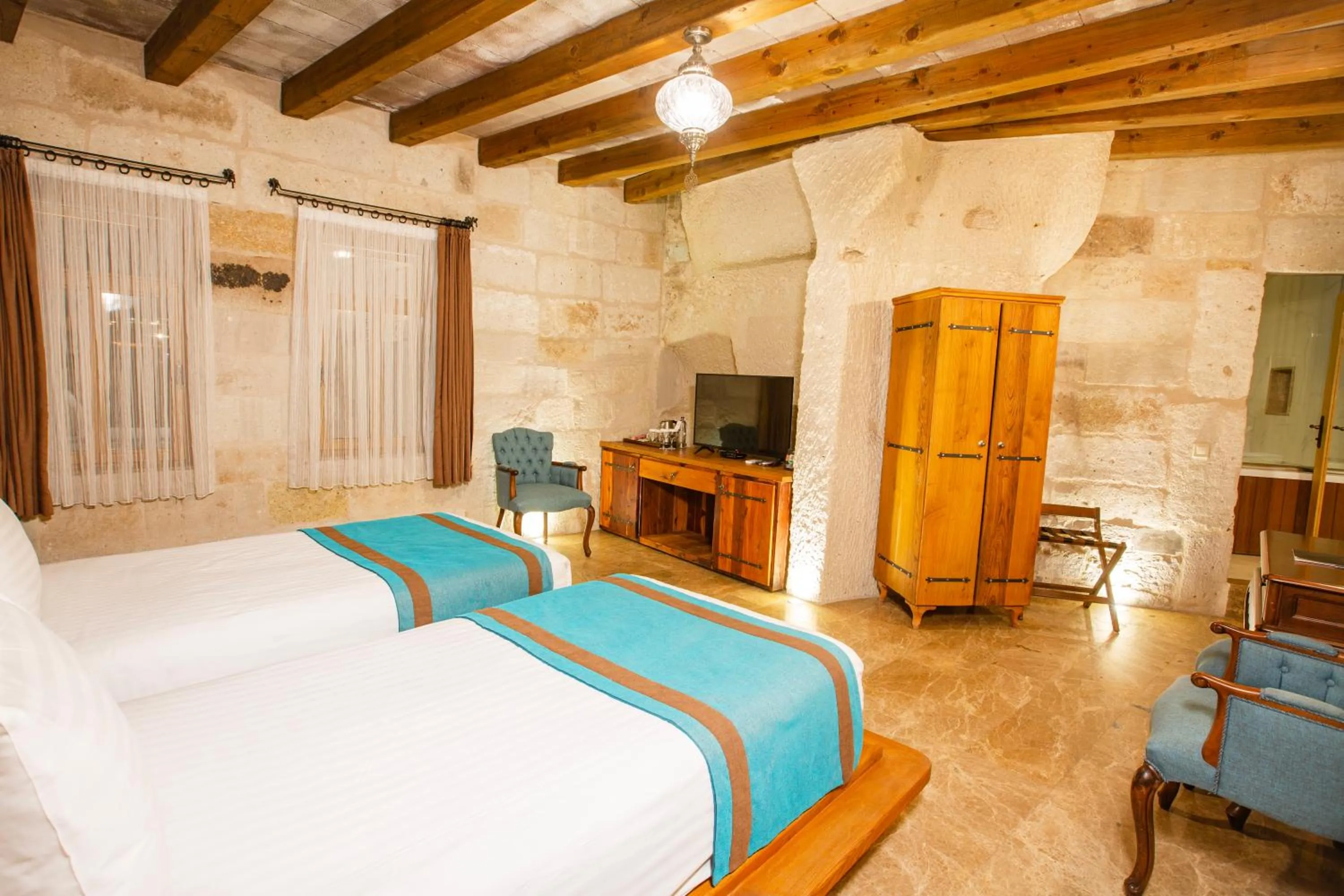 Bed in Imperial Cave Suites & Spa