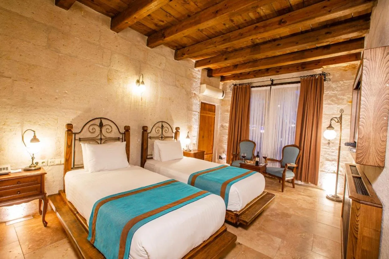 Bed in Imperial Cave Suites & Spa