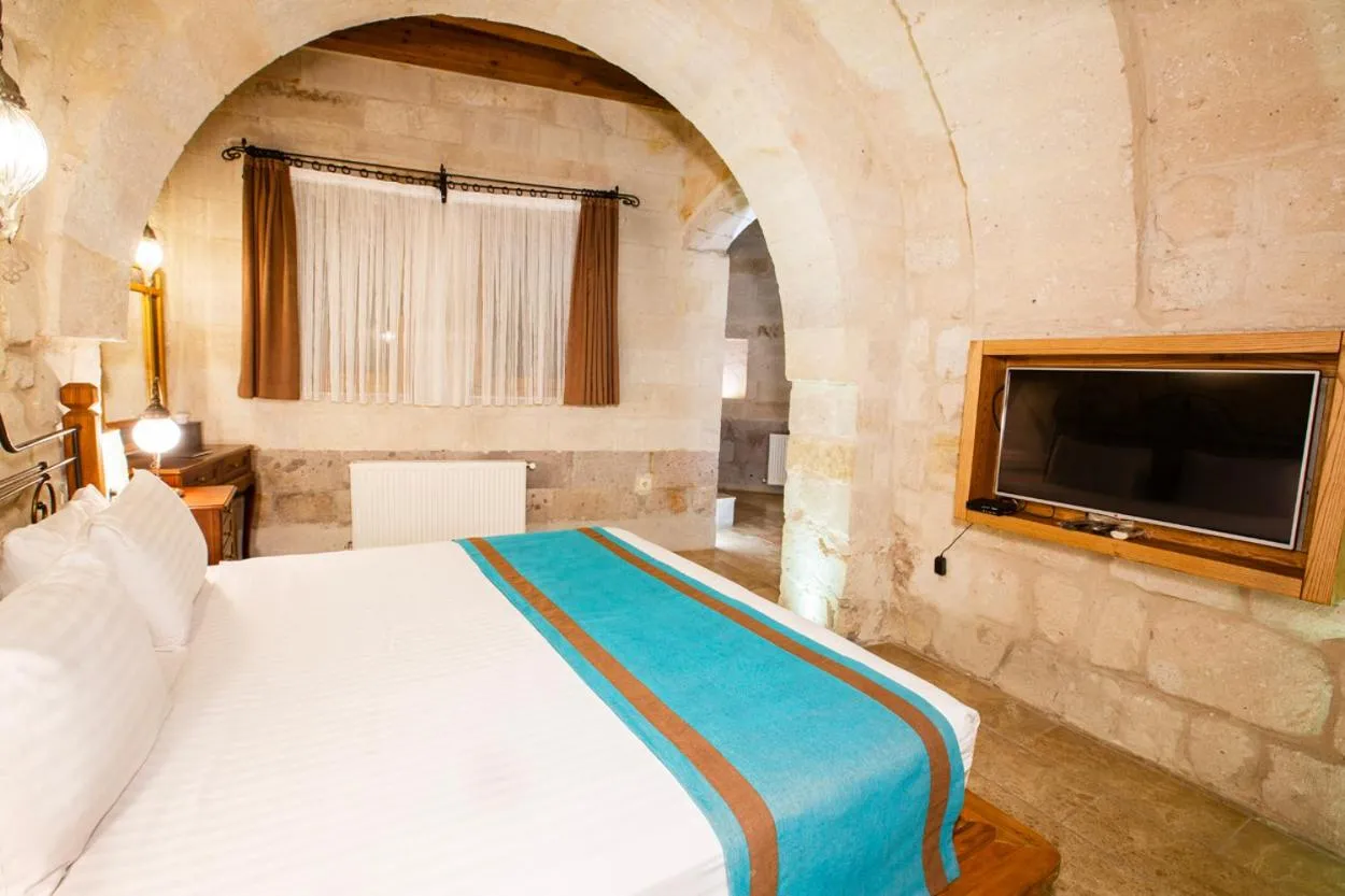 Bed in Imperial Cave Suites & Spa