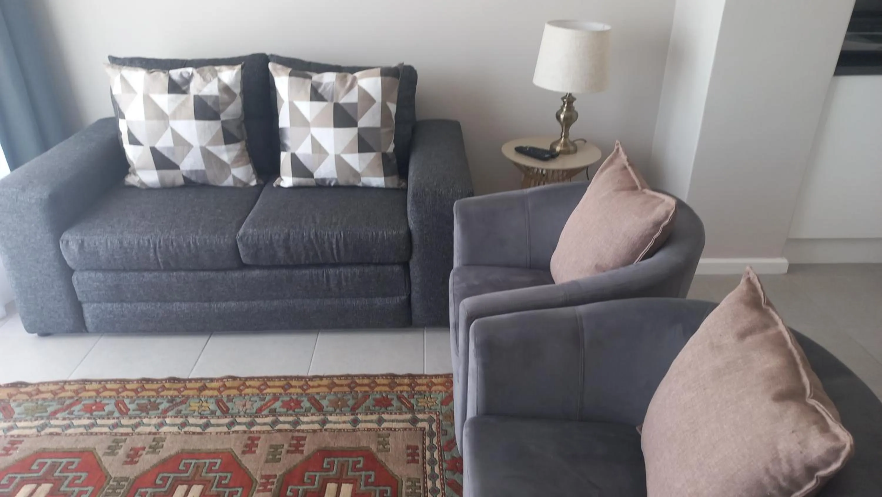 Seating area in Phoenix Lodge and Waterside Accommodation