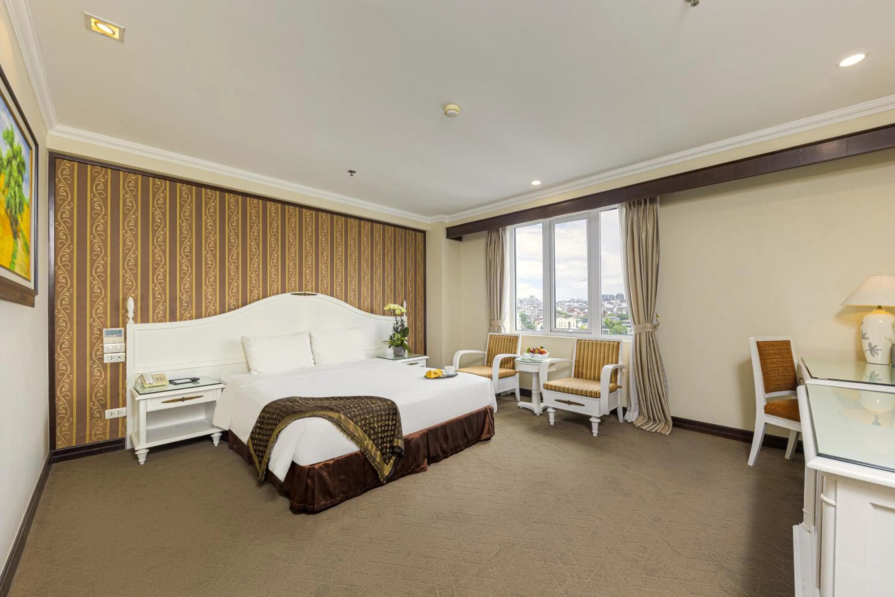 Bed in Chalcedony Grand Hotel