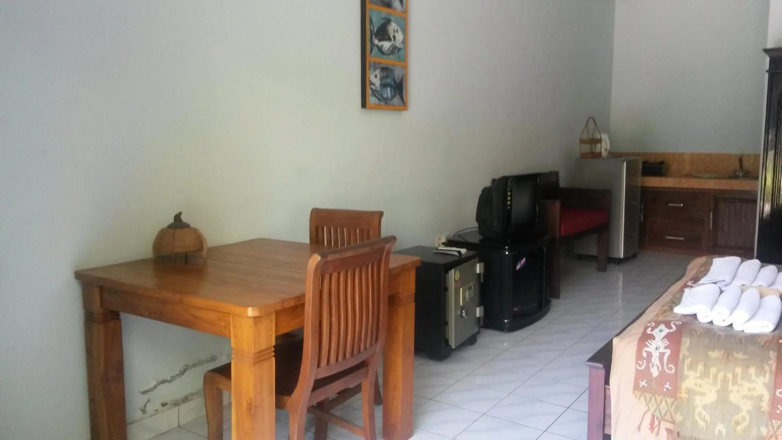Seating area, Bed in Meriki Apartment