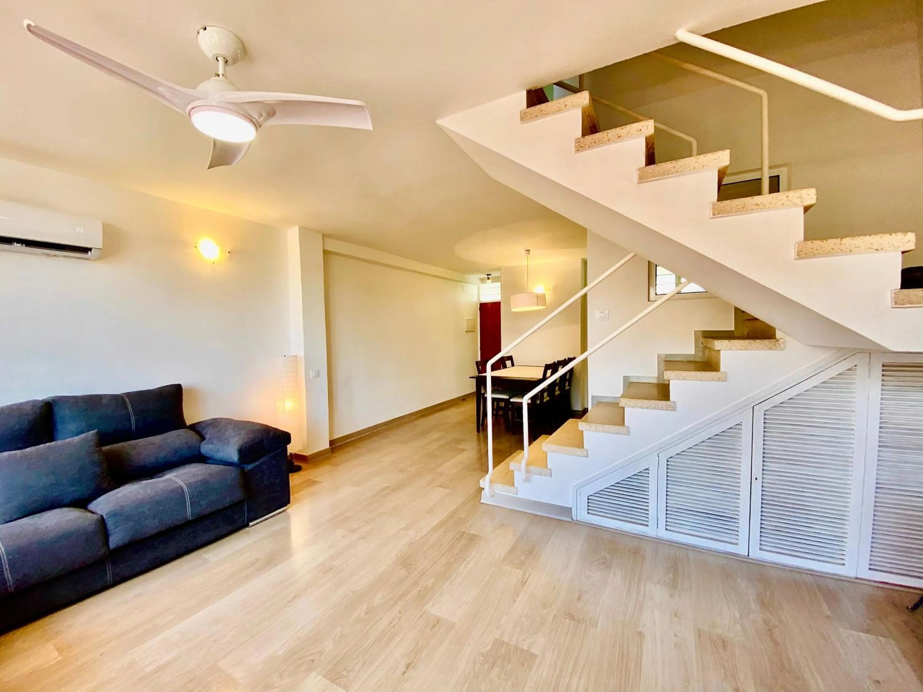 Living room in Sun pool duplex apartment by HLCLUB Agency