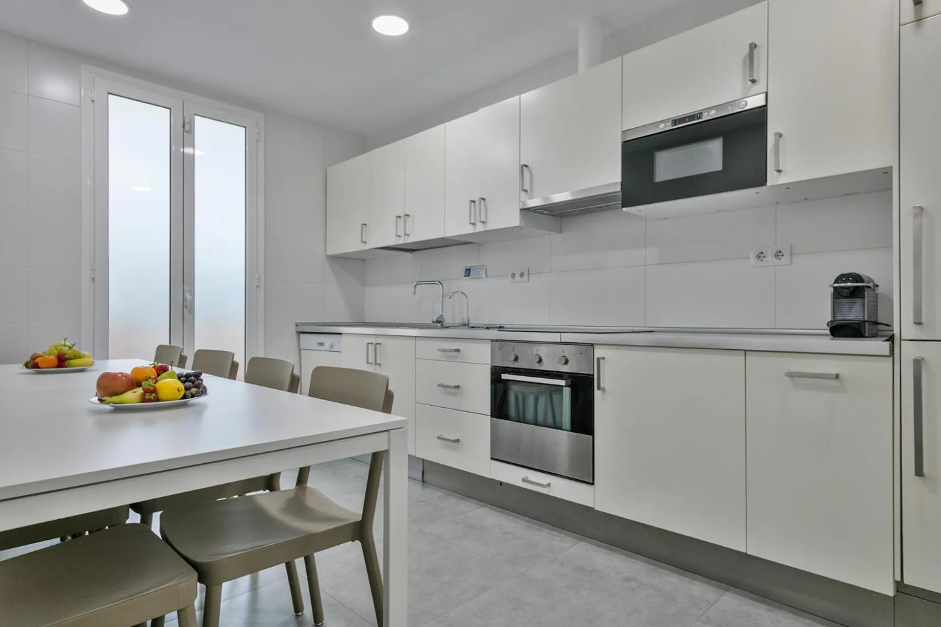 Kitchen or kitchenette in Stay Together Barcelona Apartments