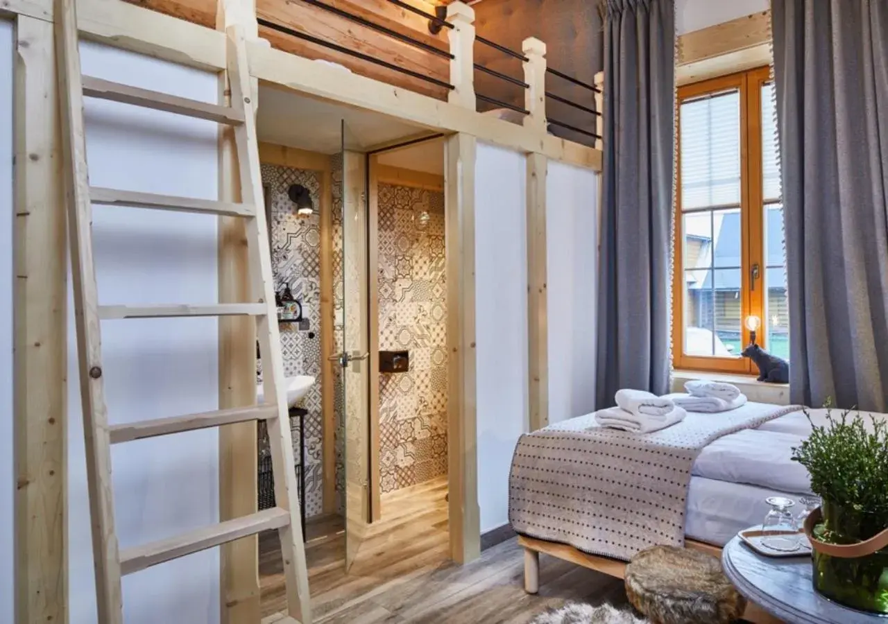 Superior Quadruple Room in Niedźwiedzia Residence Garden Sauna Superior Quadruple Room in Niedźwiedzia Residence Garden Sauna