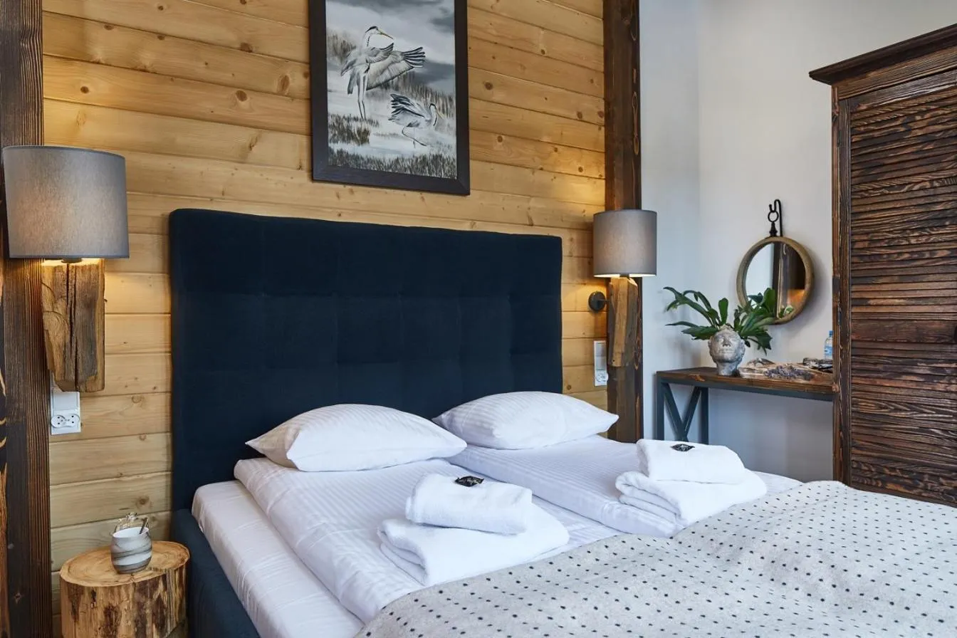 Bed in Niedźwiedzia Residence Garden Sauna