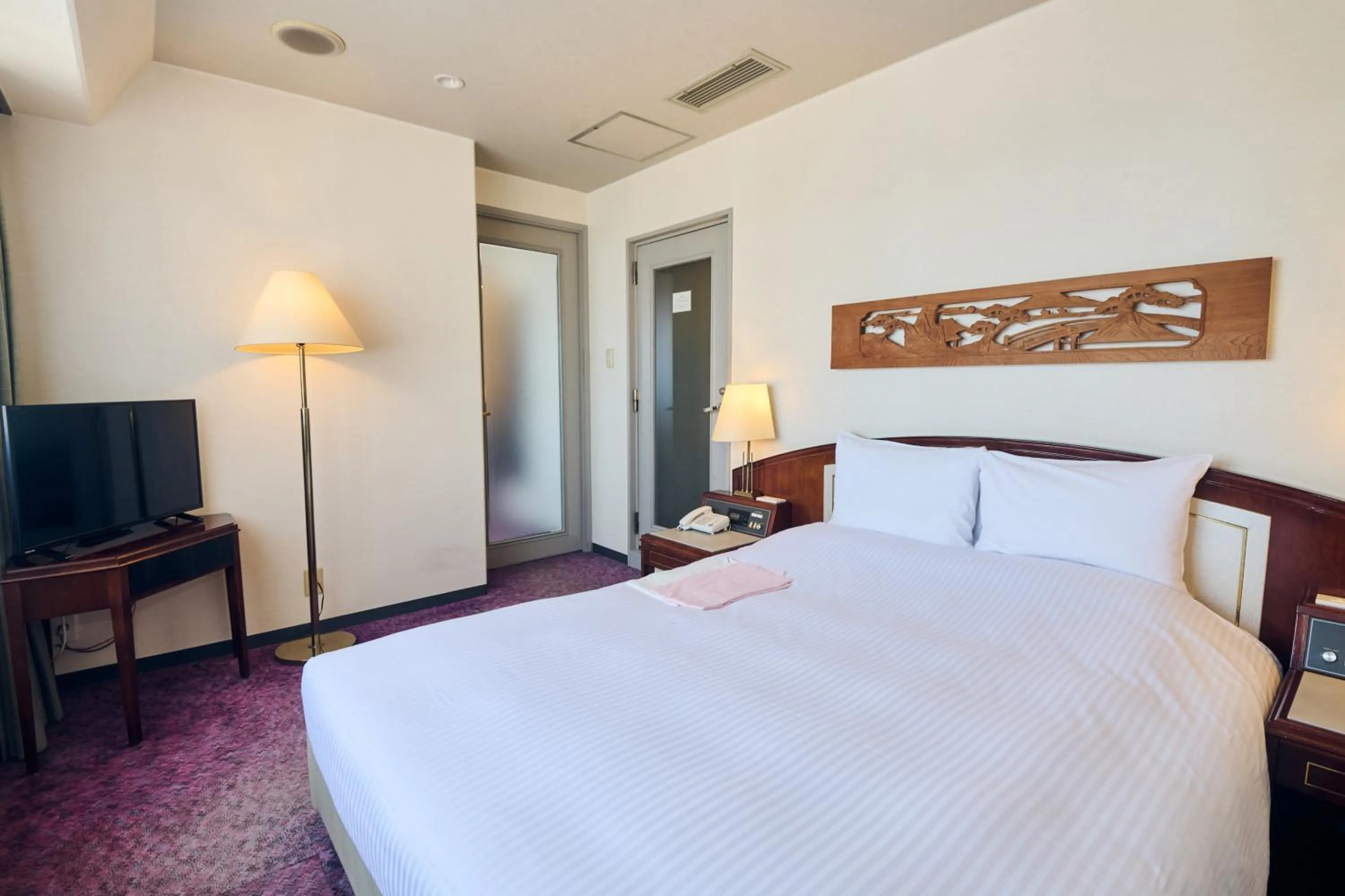 Photo of the whole room, Bed in Hotel Lexton Kagoshima