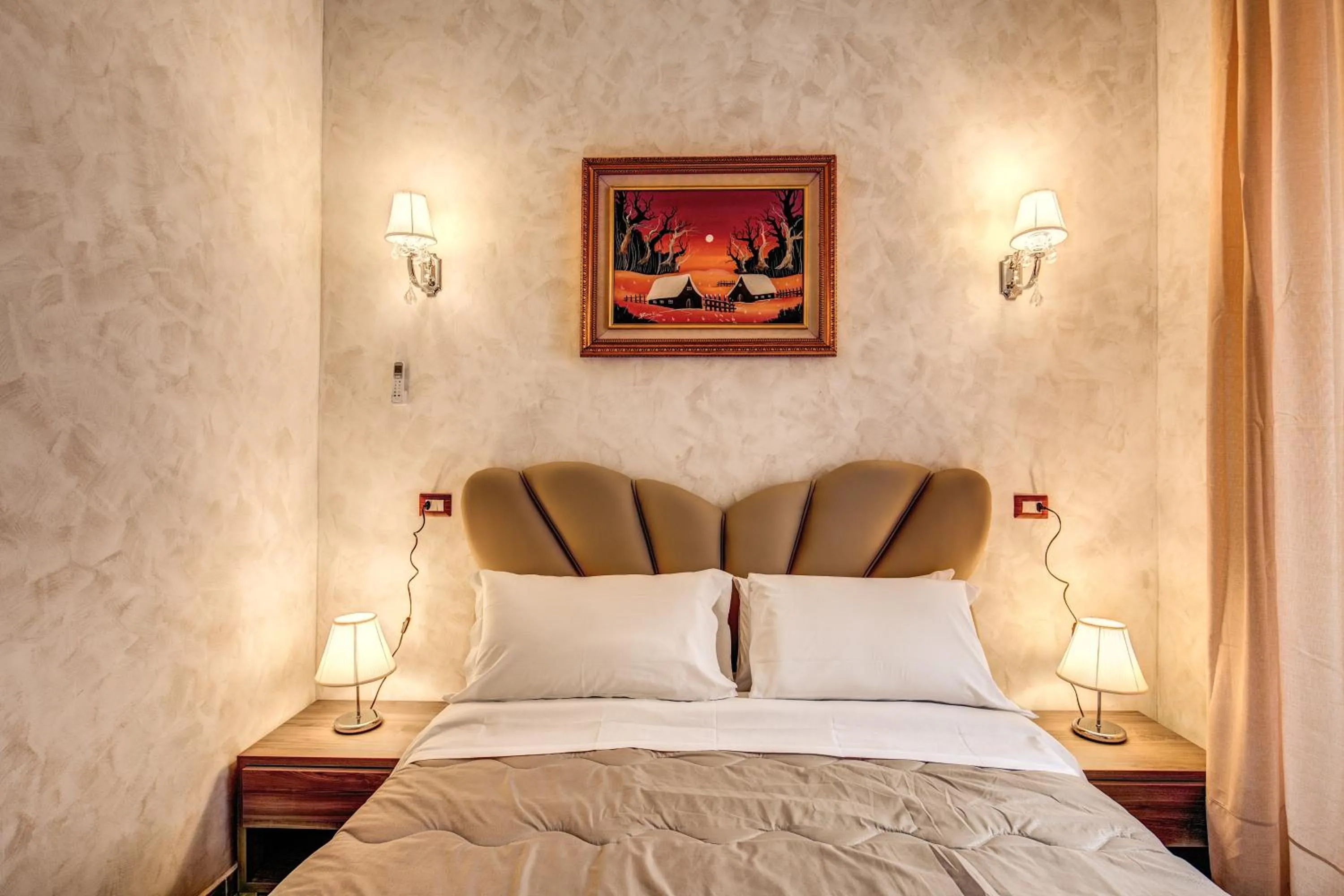 Bed in AMICI GUESTHOUSE