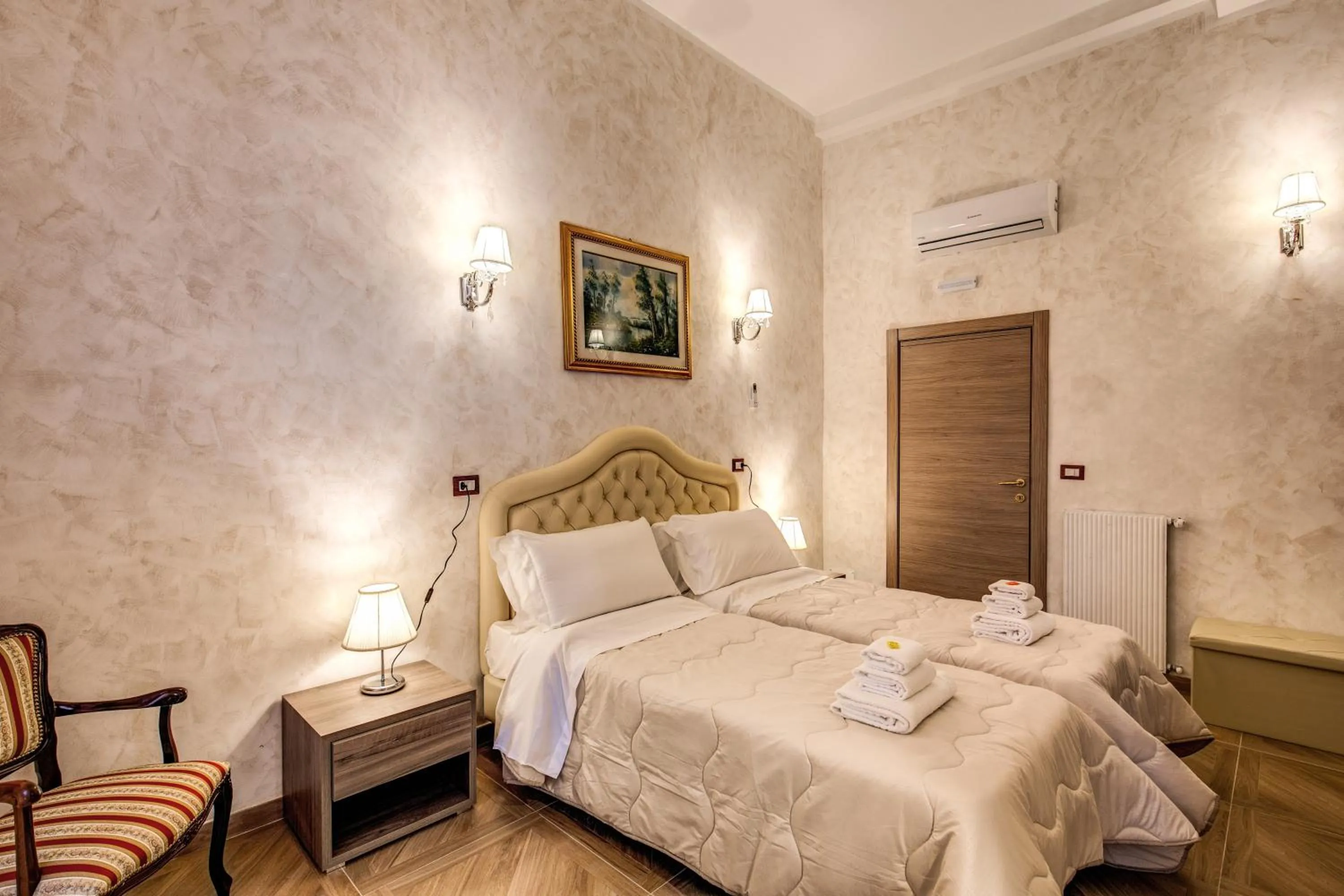 Bed in AMICI GUESTHOUSE