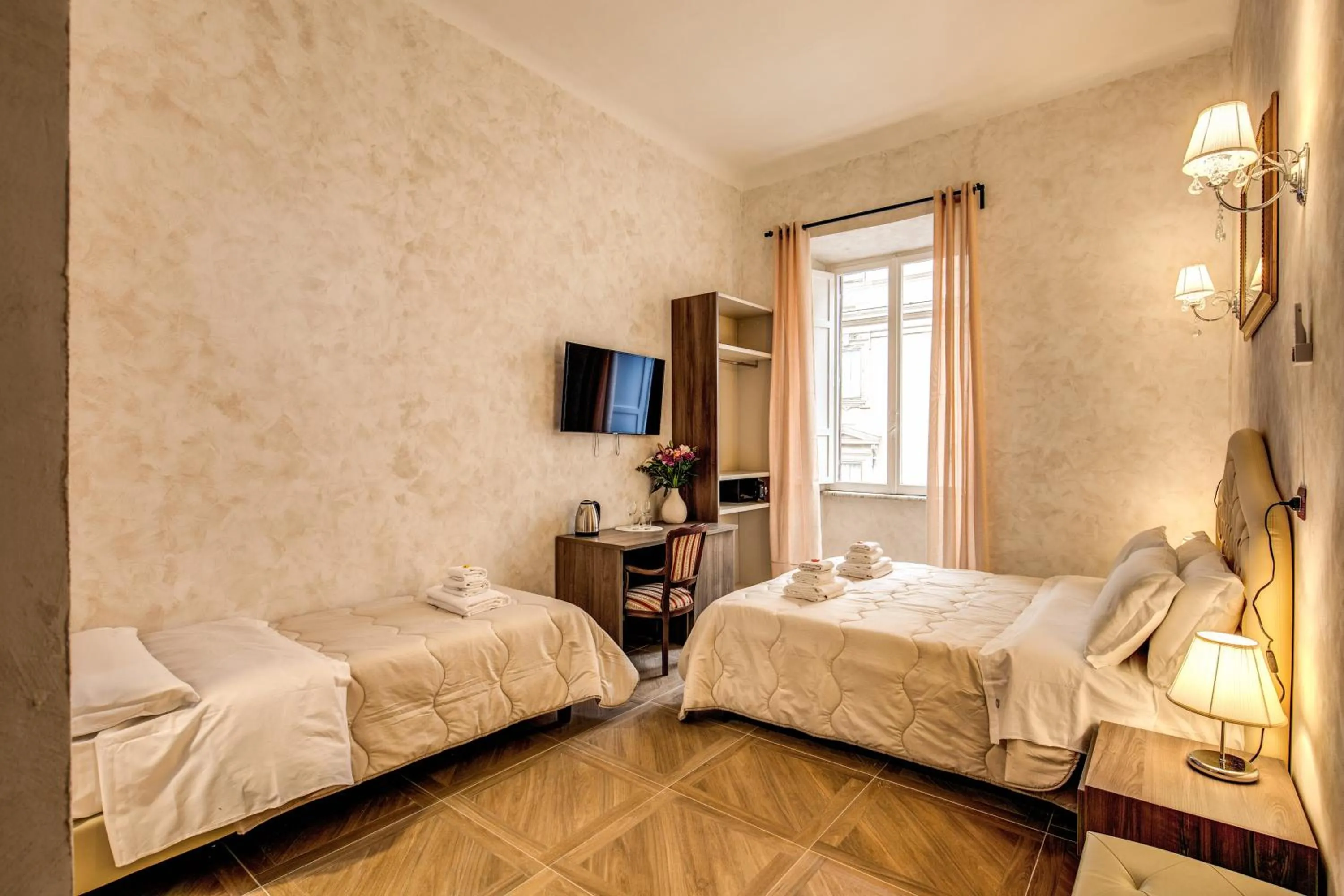 Bed in AMICI GUESTHOUSE