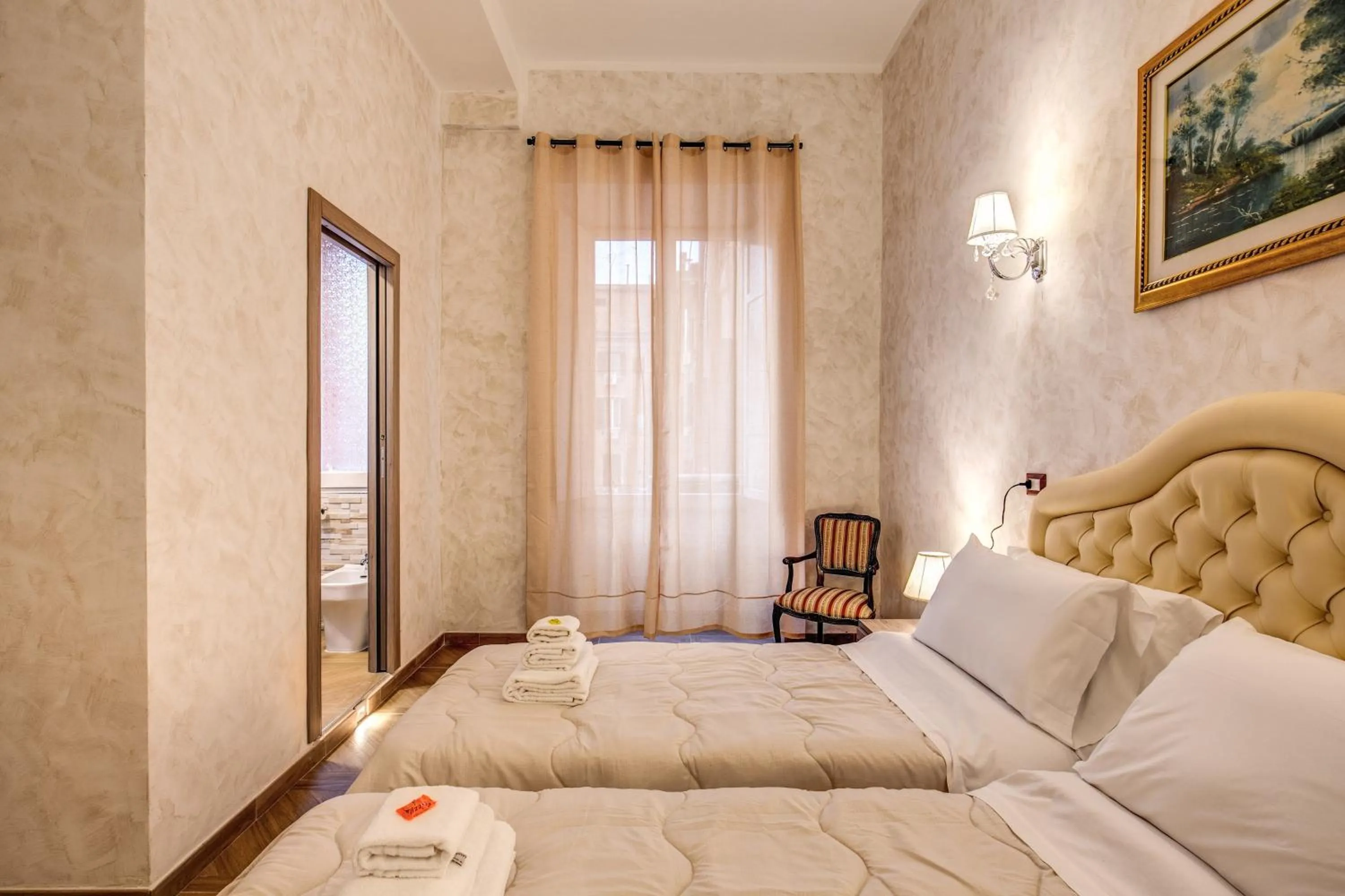 Bed in AMICI GUESTHOUSE
