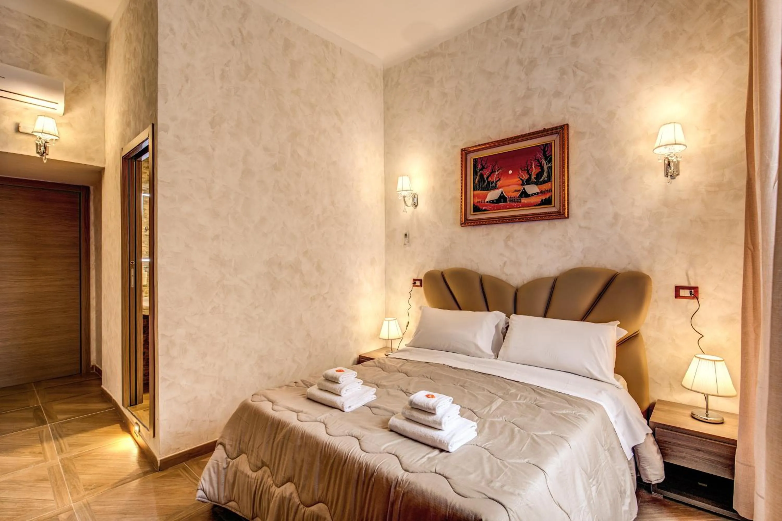 Bed in AMICI GUESTHOUSE