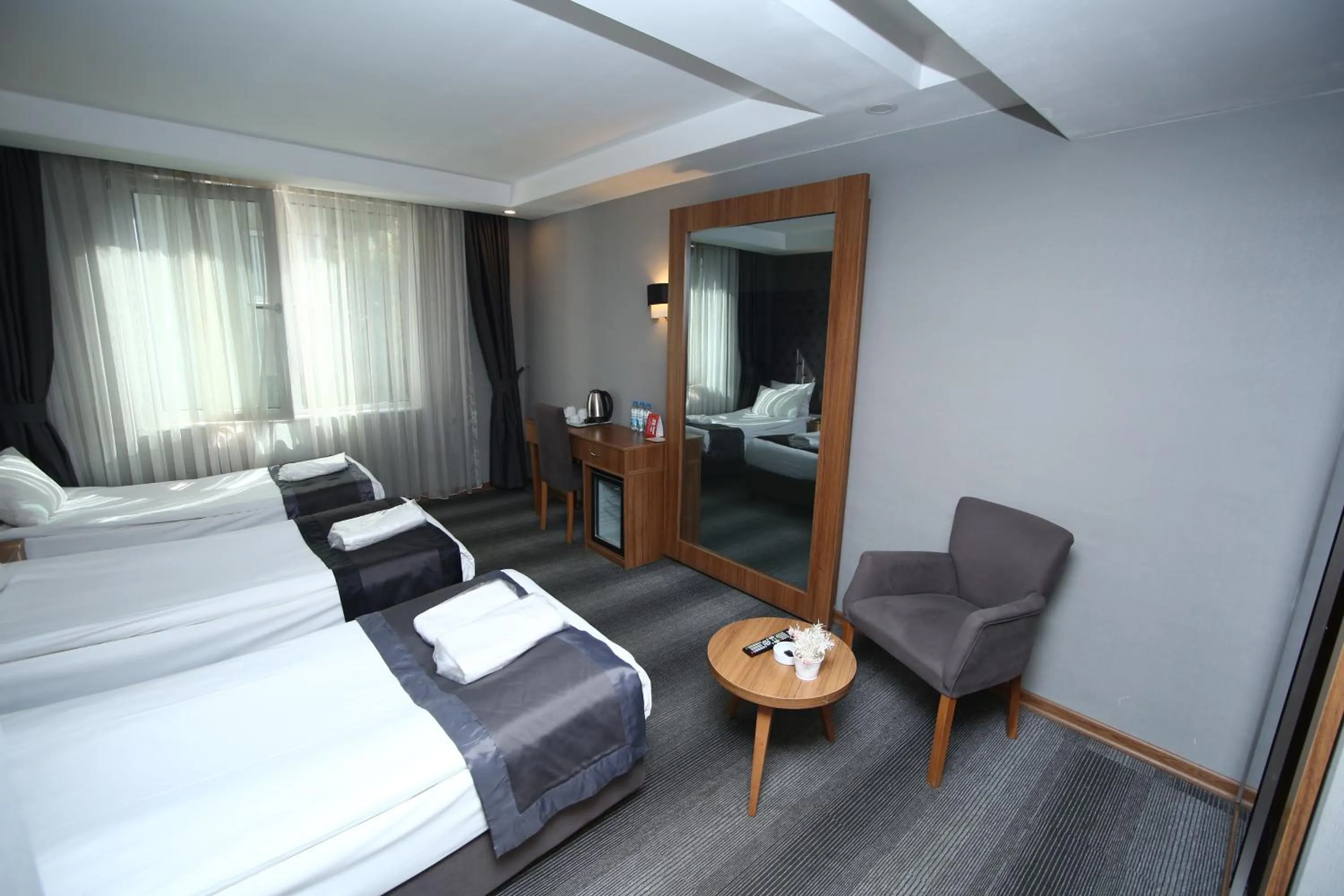 Bed in Grand Silay Hotel