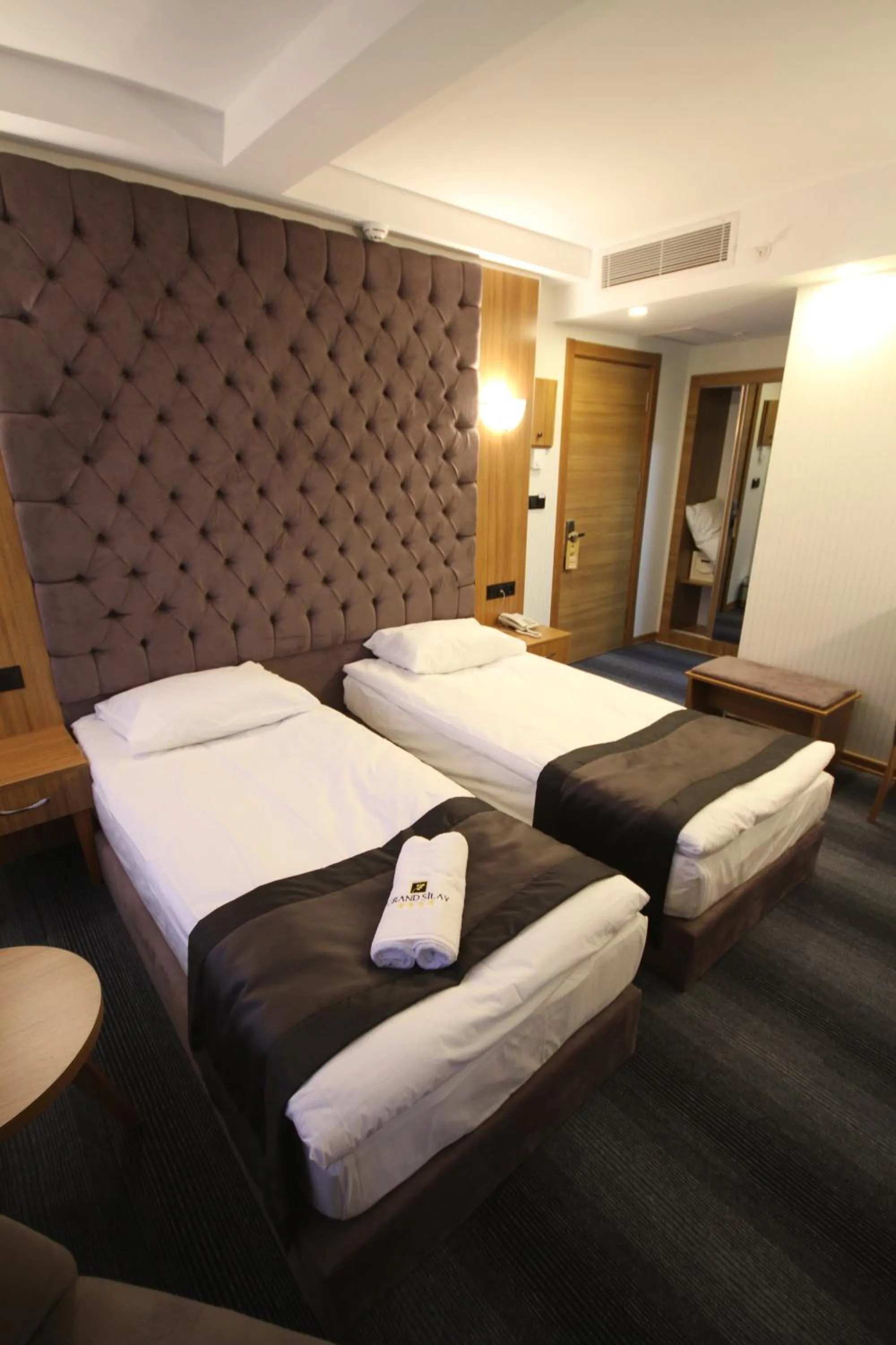 Bed in Grand Silay Hotel