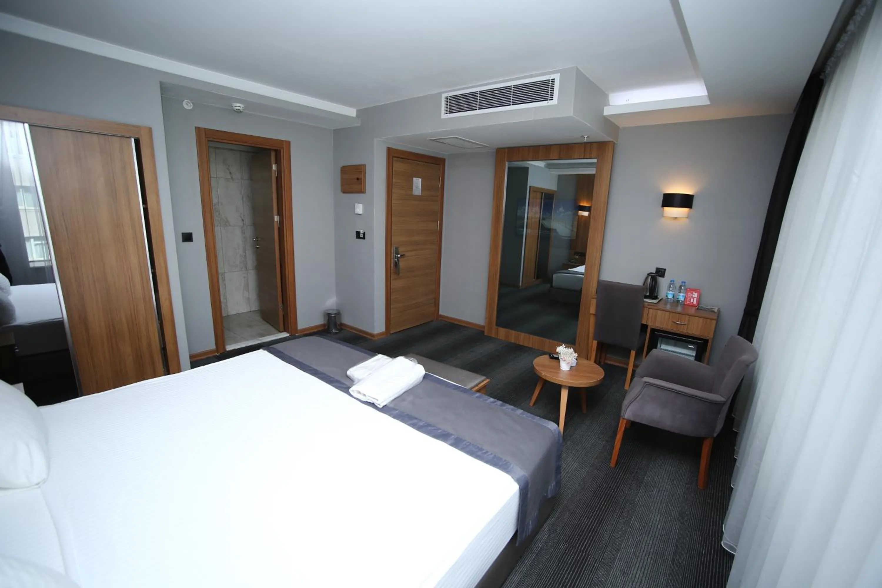 Bed in Grand Silay Hotel