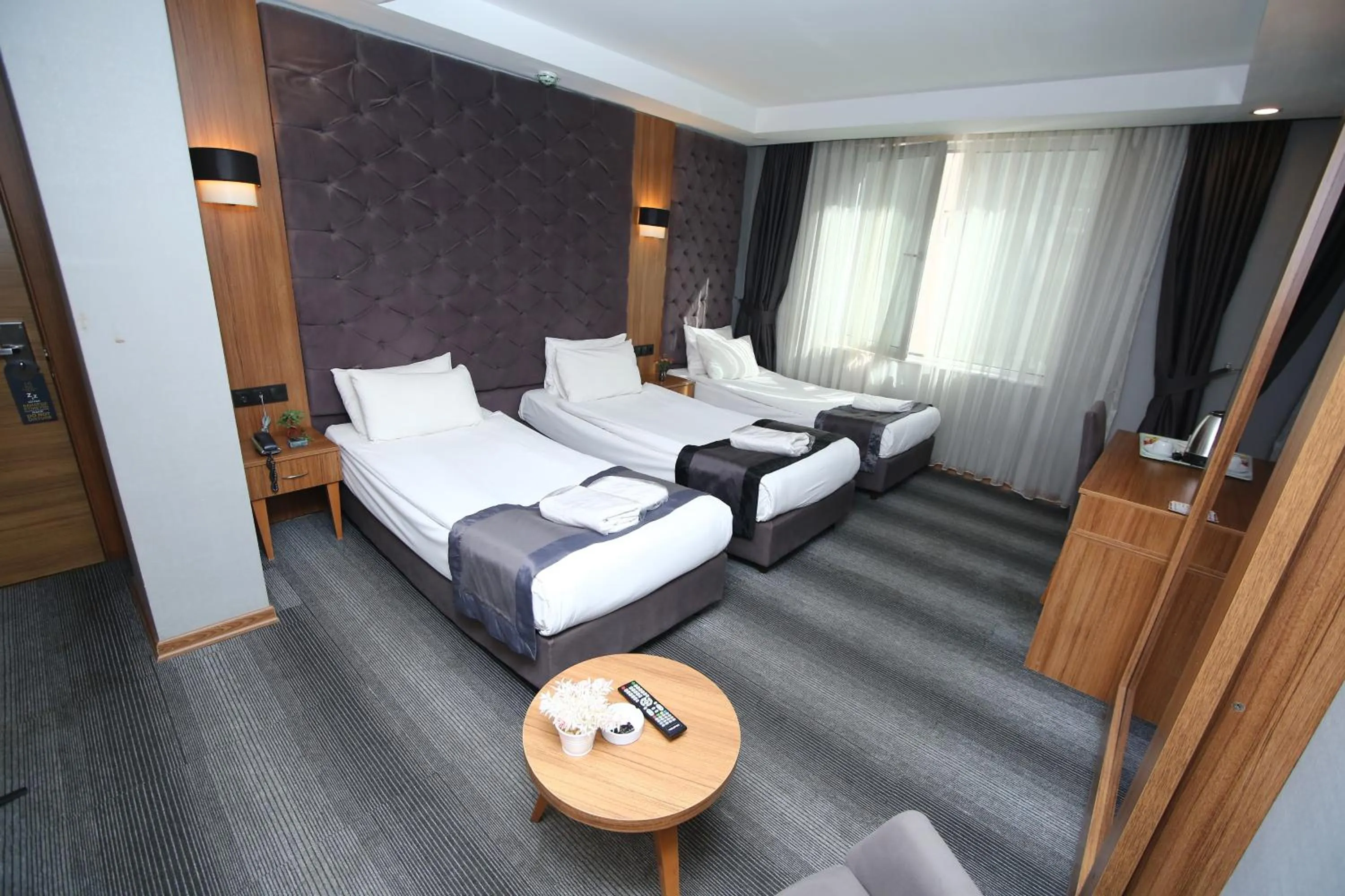 Bed in Grand Silay Hotel