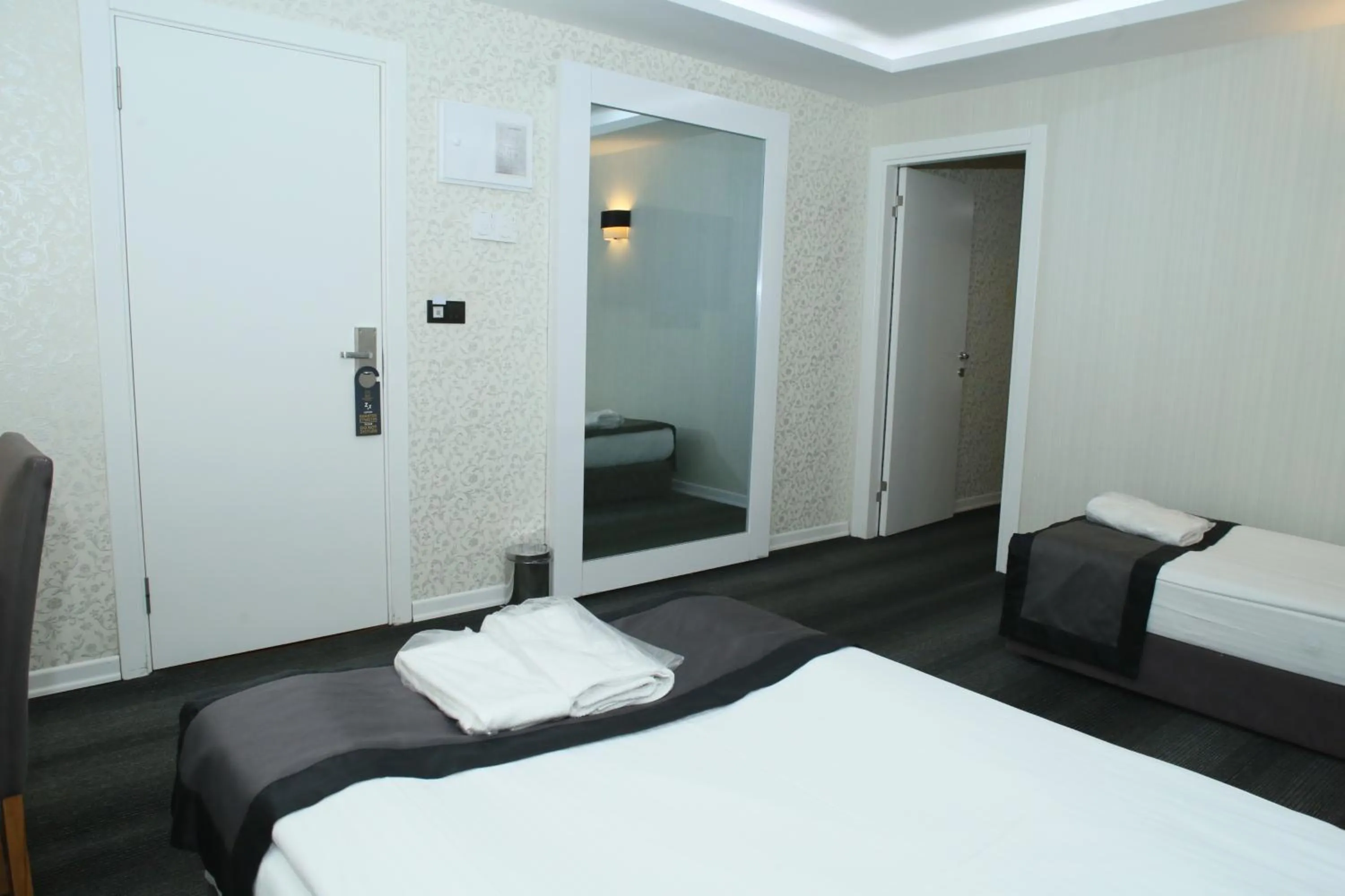 Bed in Grand Silay Hotel