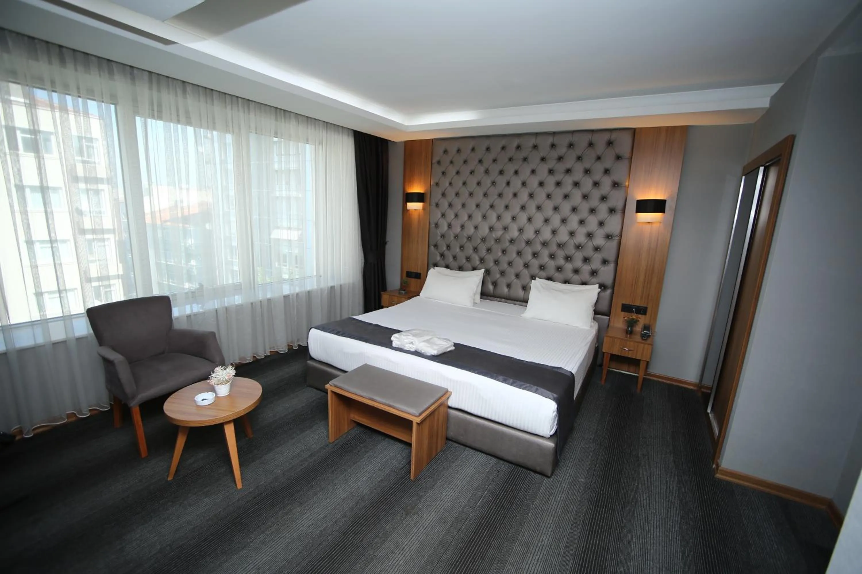 Bed in Grand Silay Hotel