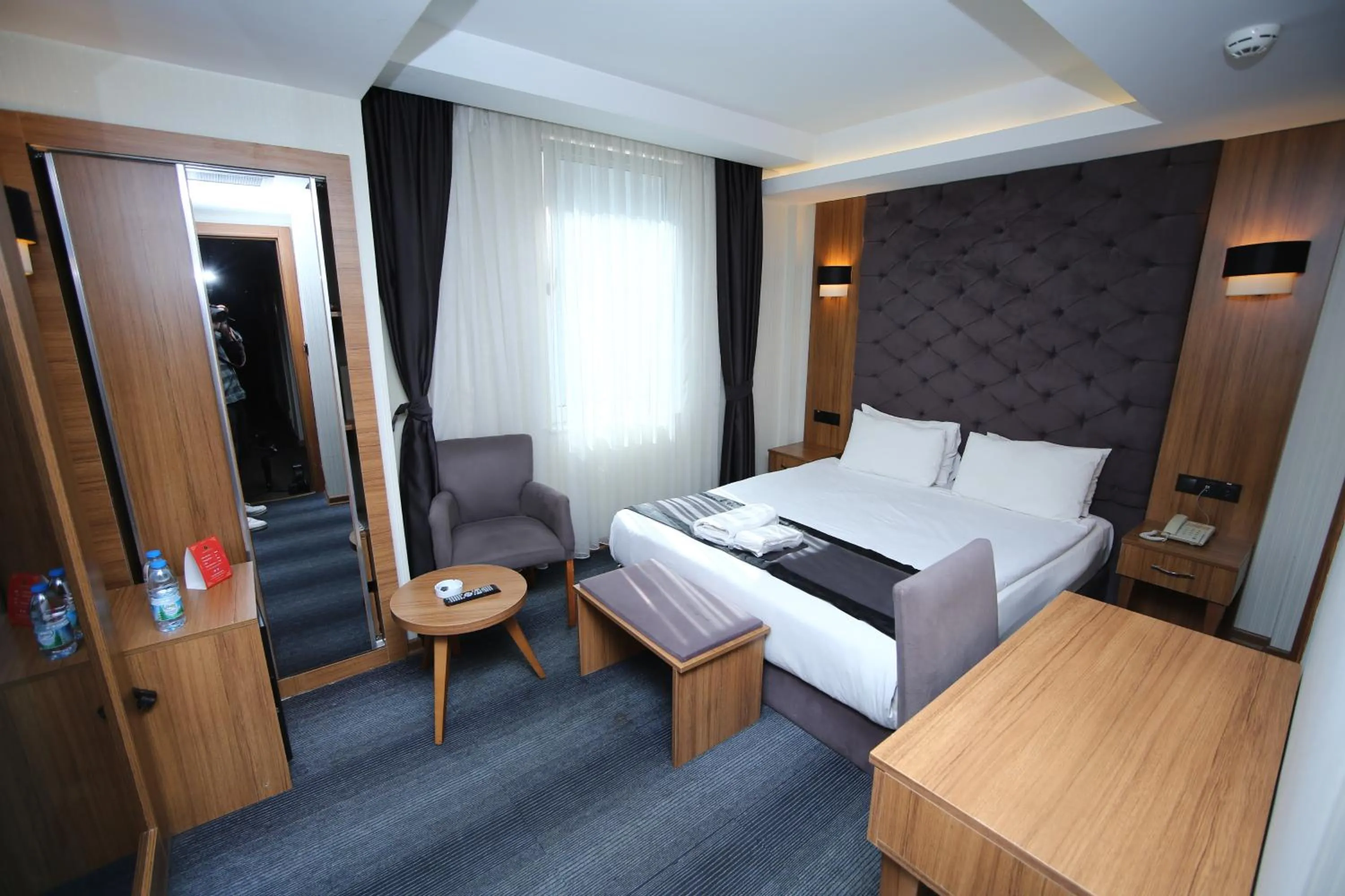 Bed in Grand Silay Hotel