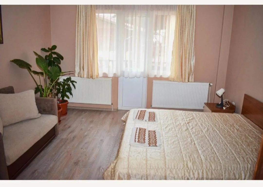 Toilet, Bed in Family Hotel Miglena