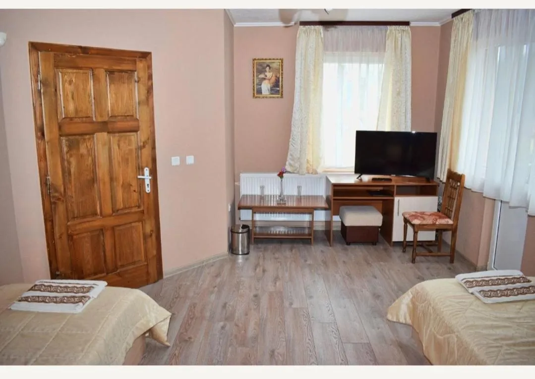 Toilet, Bed in Family Hotel Miglena