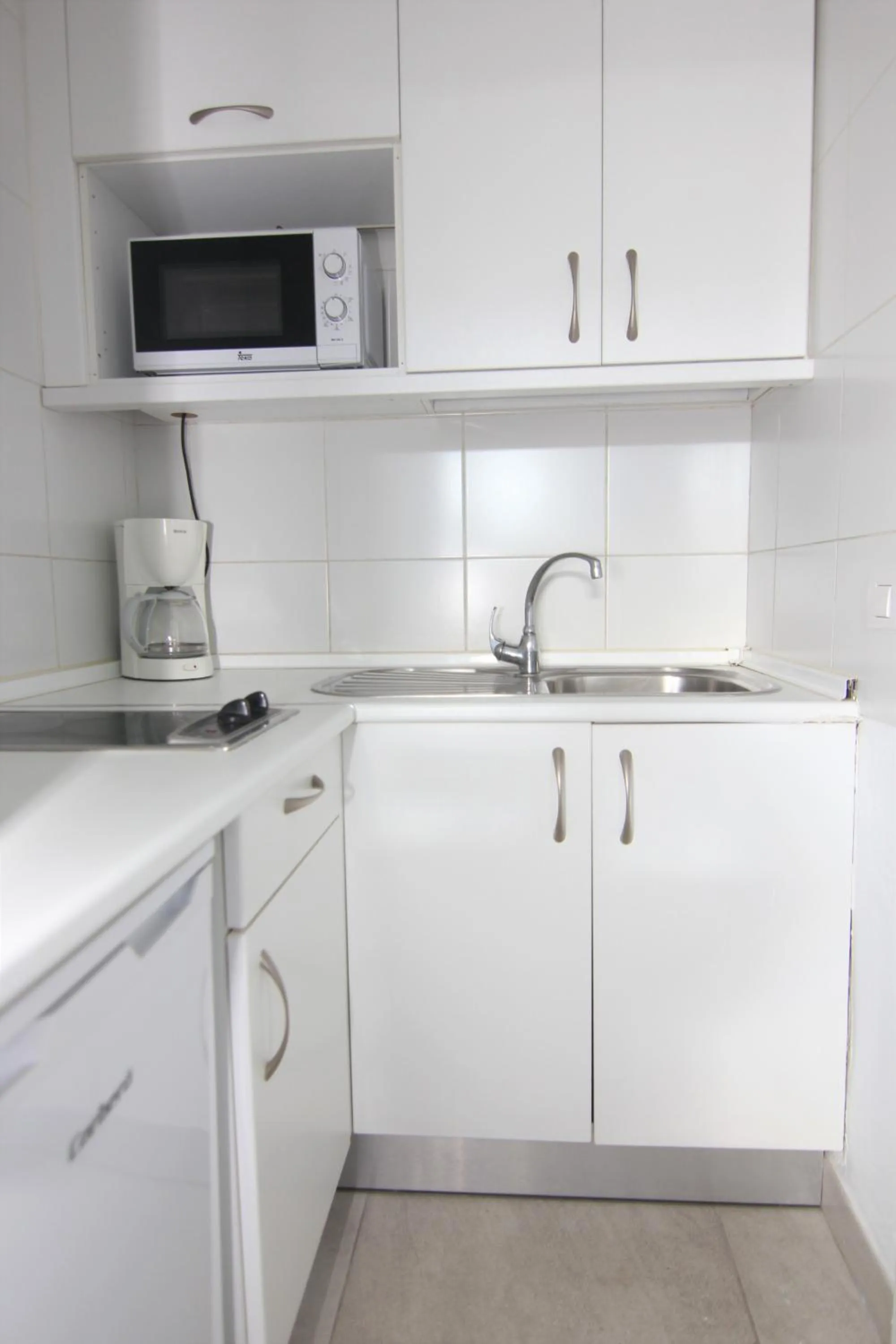Kitchen or kitchenette in Apartamentos Orly Club Arena Dorada