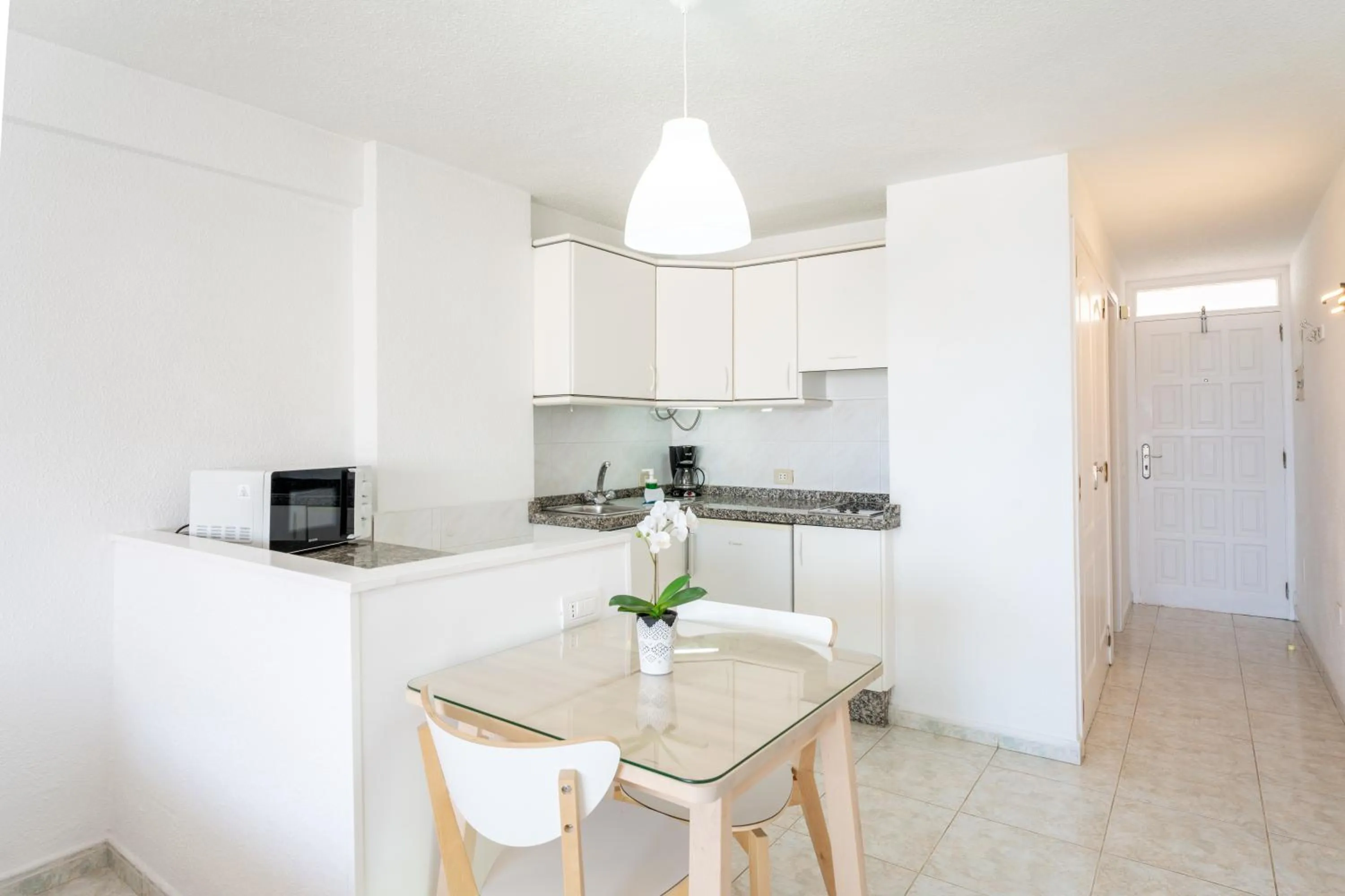 Kitchen or kitchenette in Apartamentos Borinquen