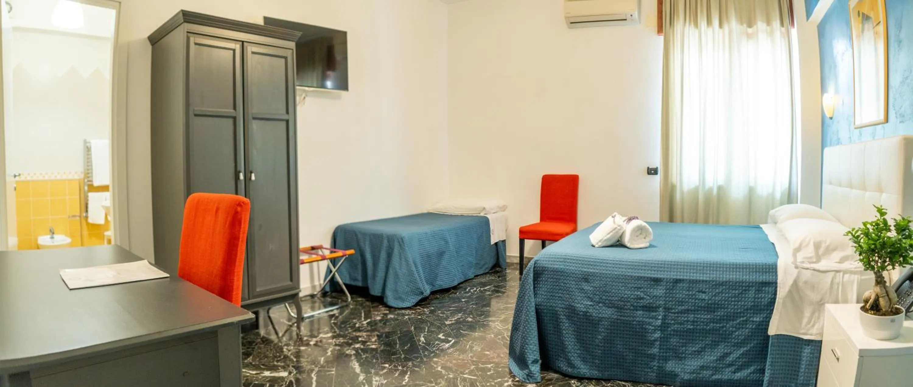 Bed in Diana Inn Accommodations