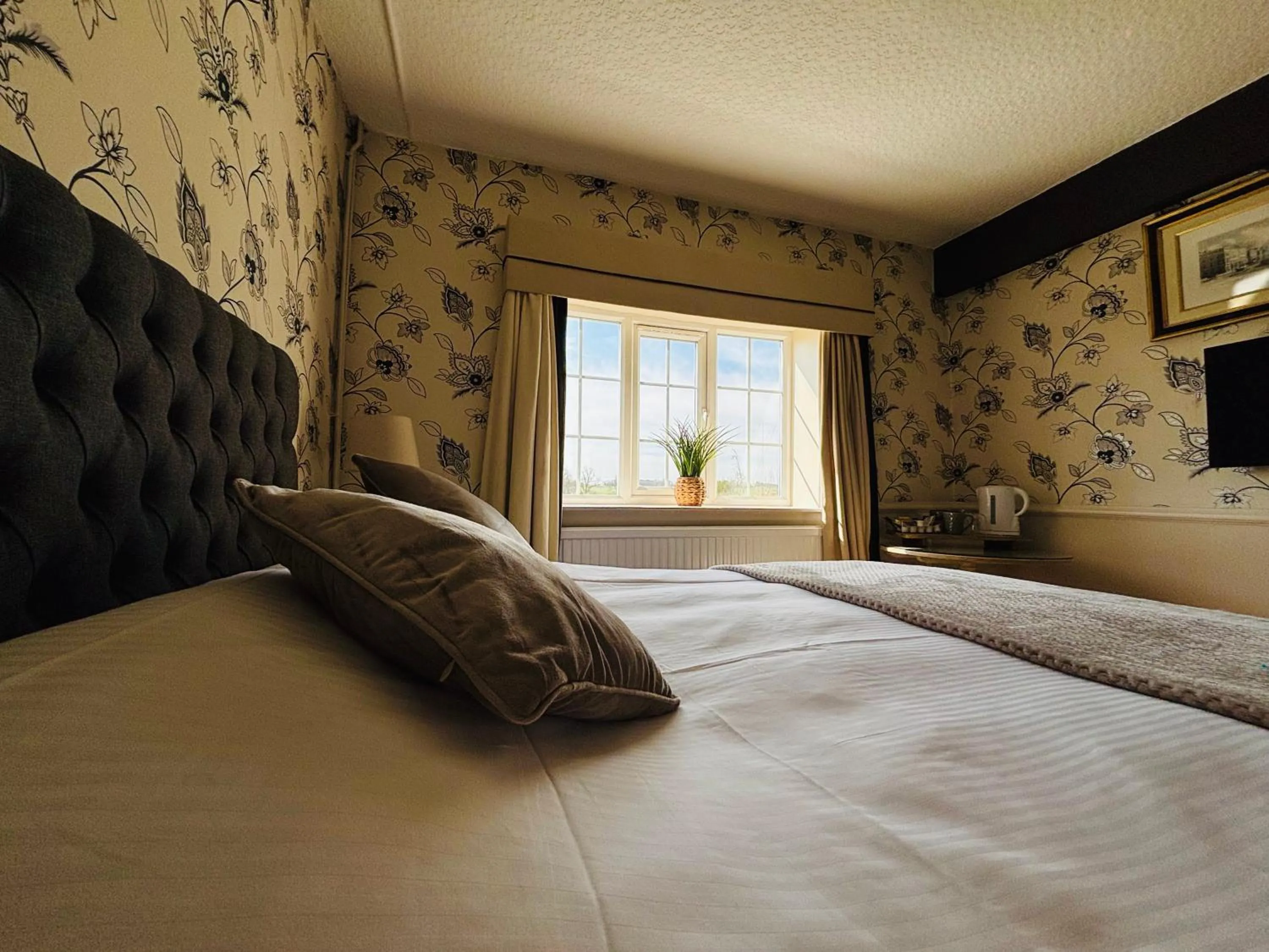 Bed in The Sibson Inn Hotel