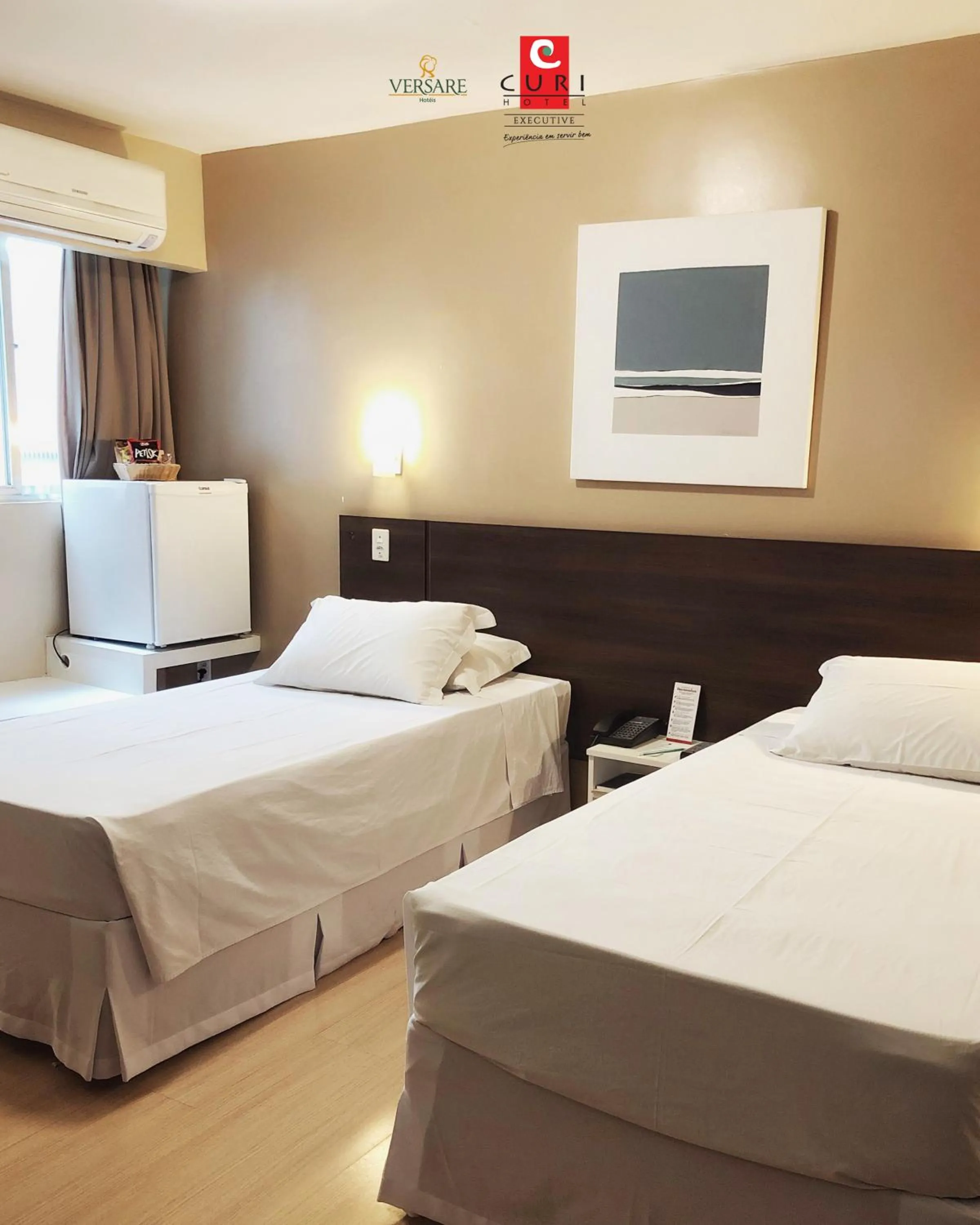 Bed in Hotel Curi Executive