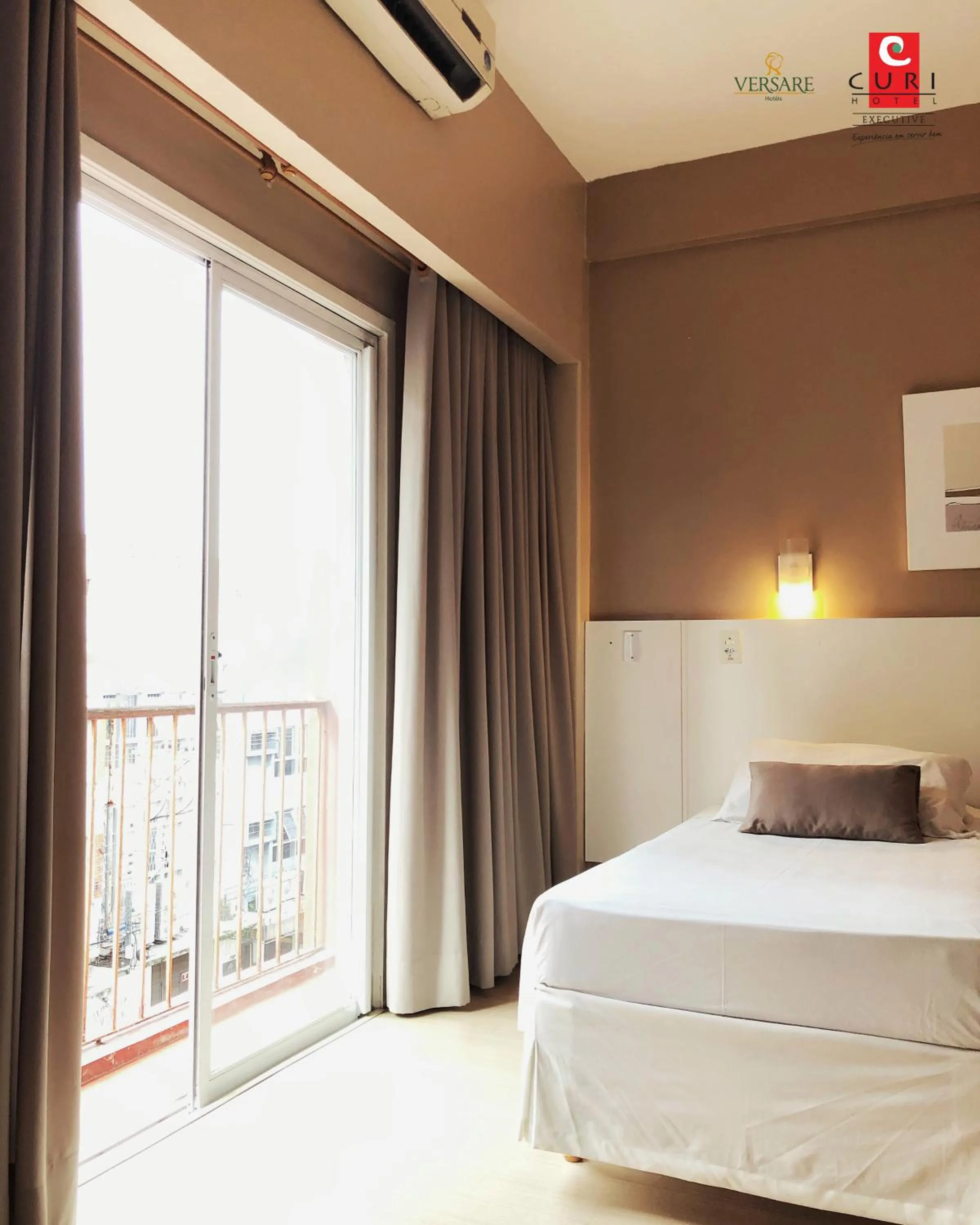 Bed in Hotel Curi Executive