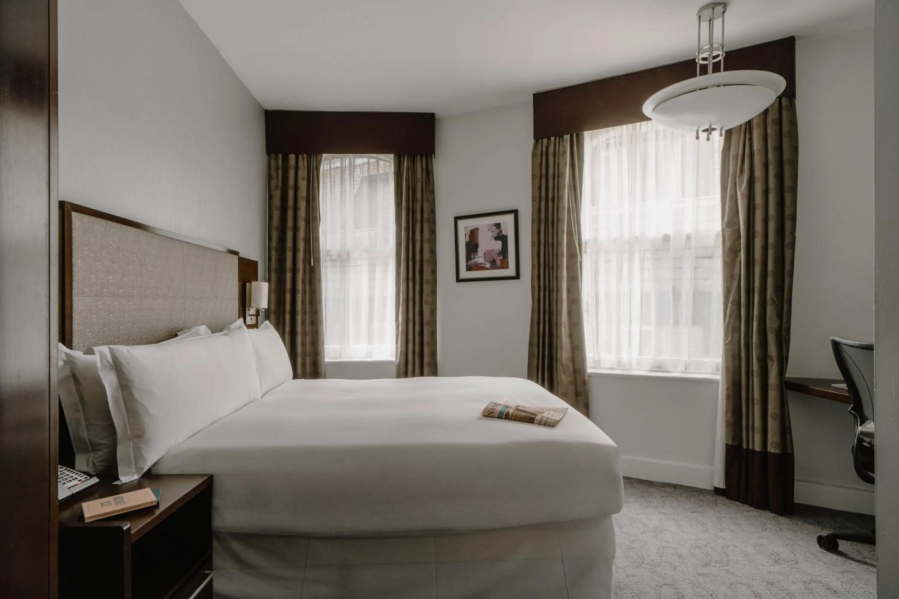 Bed in Club Quarters Hotel Trafalgar Square, London