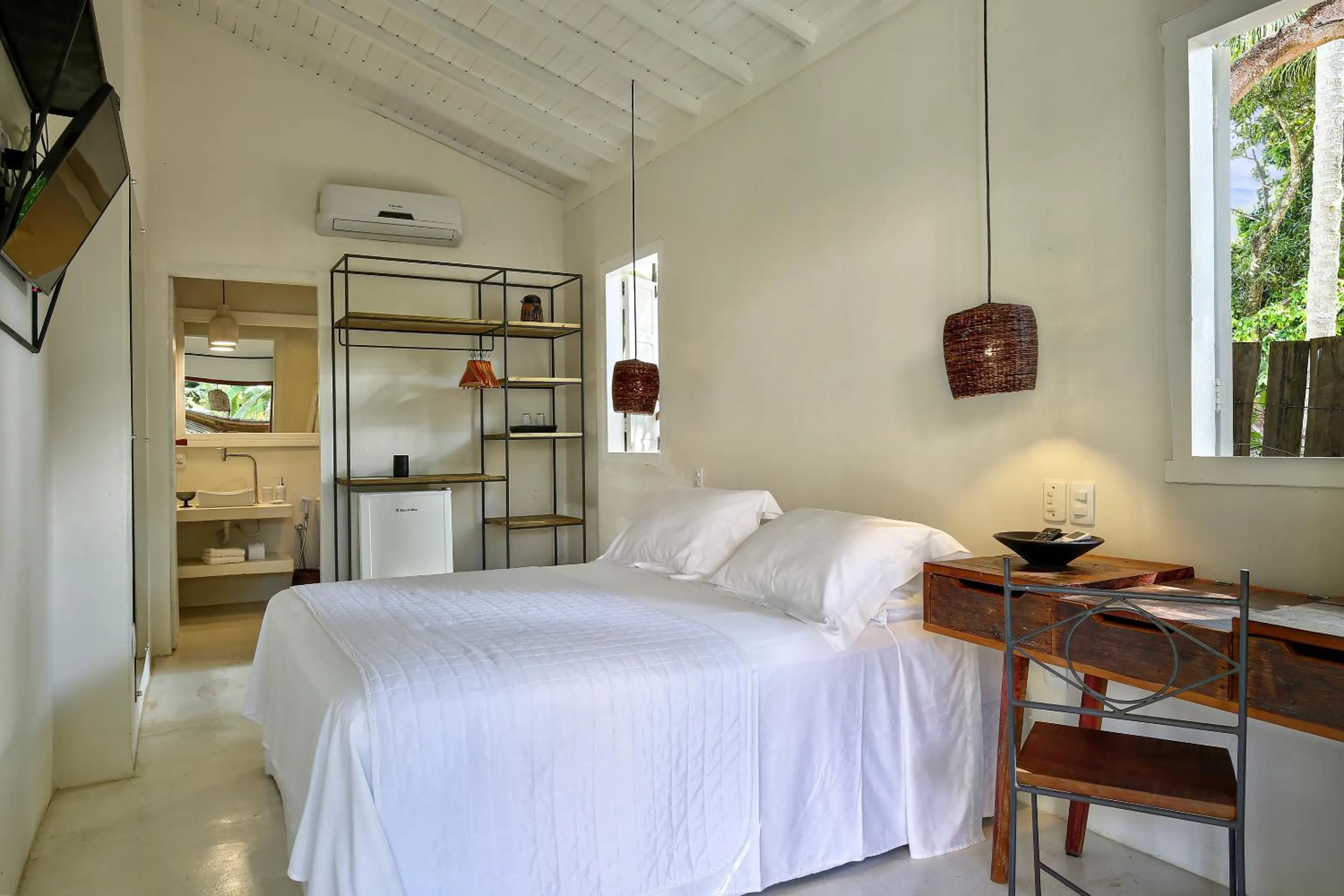 Bed in Pousada Seis e Meia